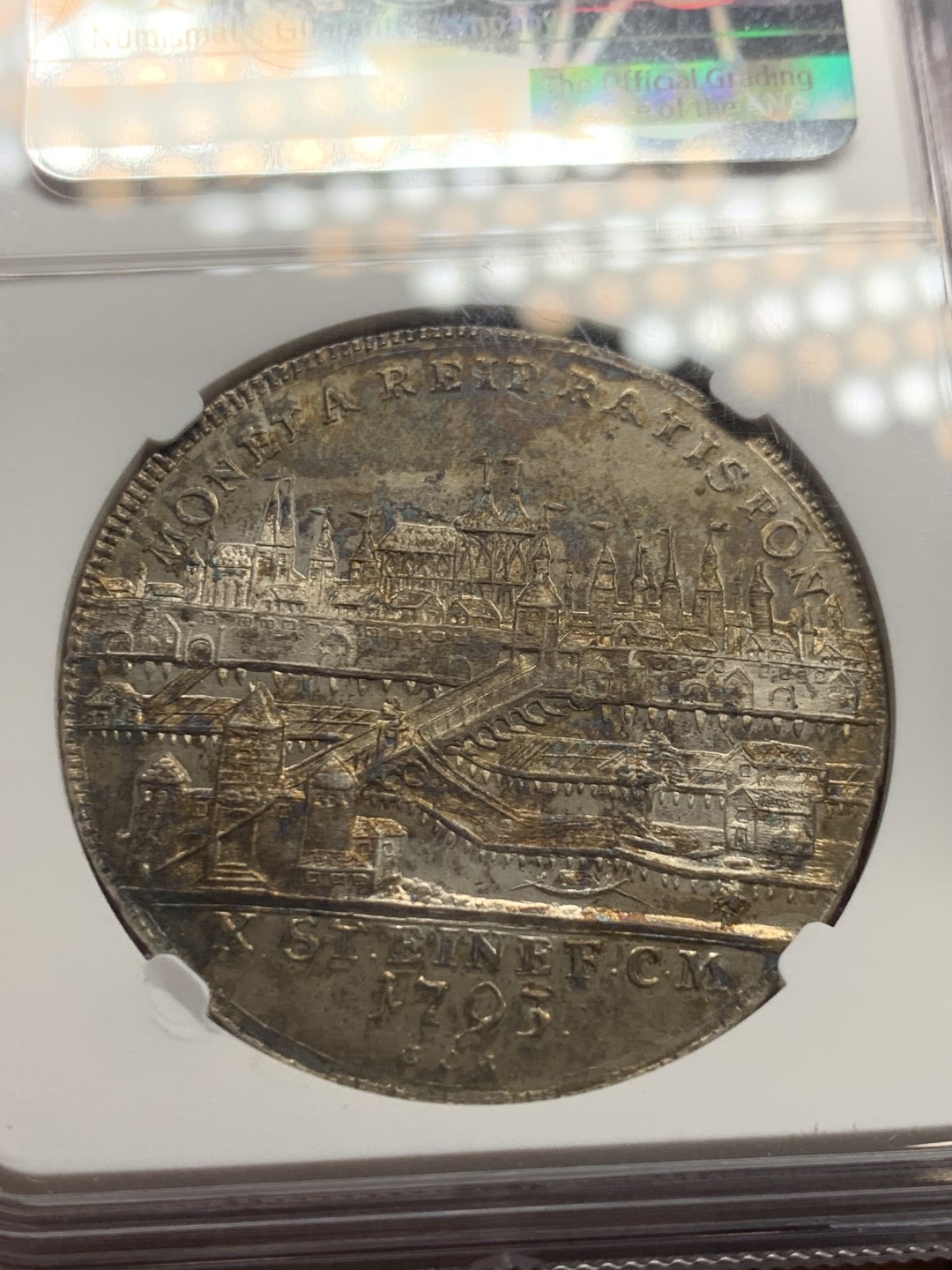 《竞宝斋》第147场-周日，周一 2场 (全场包邮) NGC MS61 1793神圣罗马帝国末代皇帝弗朗茨二世雷根斯堡市 景观大泰勒银币，价格平稳上涨的品种，老包浆，带点PL的感觉。很漂亮