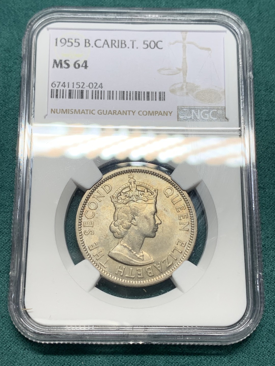 《竞宝斋》第147场-周日，周一 2场 (全场包邮) NGC MS64英属东加勒比1955年50分背面女王手握波塞冬的三叉戟并控制着马头鱼尾的神兽是希腊神话中的Hippocampu是，象征着掌握东加勒比海的海洋霸权