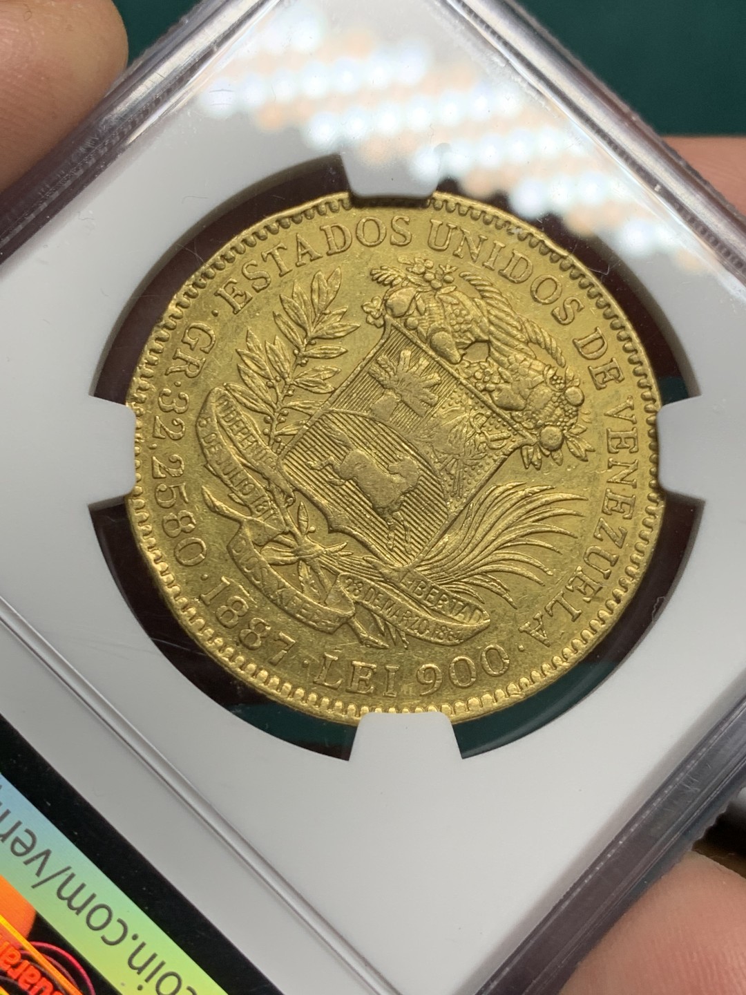 《竞宝斋》第147场-周日，周一 2场 (全场包邮) NGC-AU 委内瑞拉1887年 100玻利瓦尔大金币 南美系早期金币 大多数都已经涨上天了 只有这款算是洼地