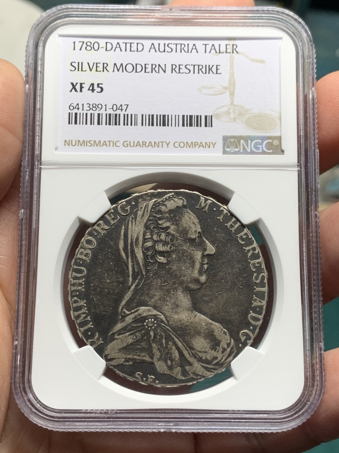 《竞宝斋》第147场-周日，周一 2场 (全场包邮) NGC-XF45 奥地利1780年 大奶妈泰勒 这枚看包浆和羽毛应该是早期的罗马版的后铸