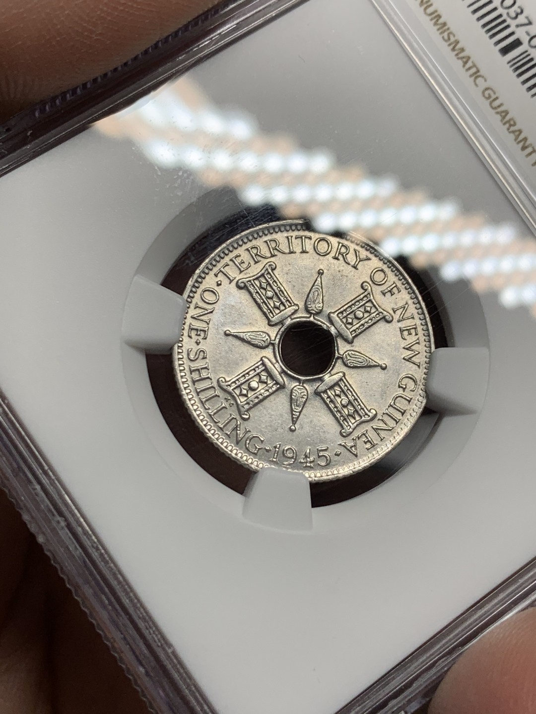 《竞宝斋》第147场-周日，周一 2场 (全场包邮) NGC MS62 1945新几内亚乔六1先令银币