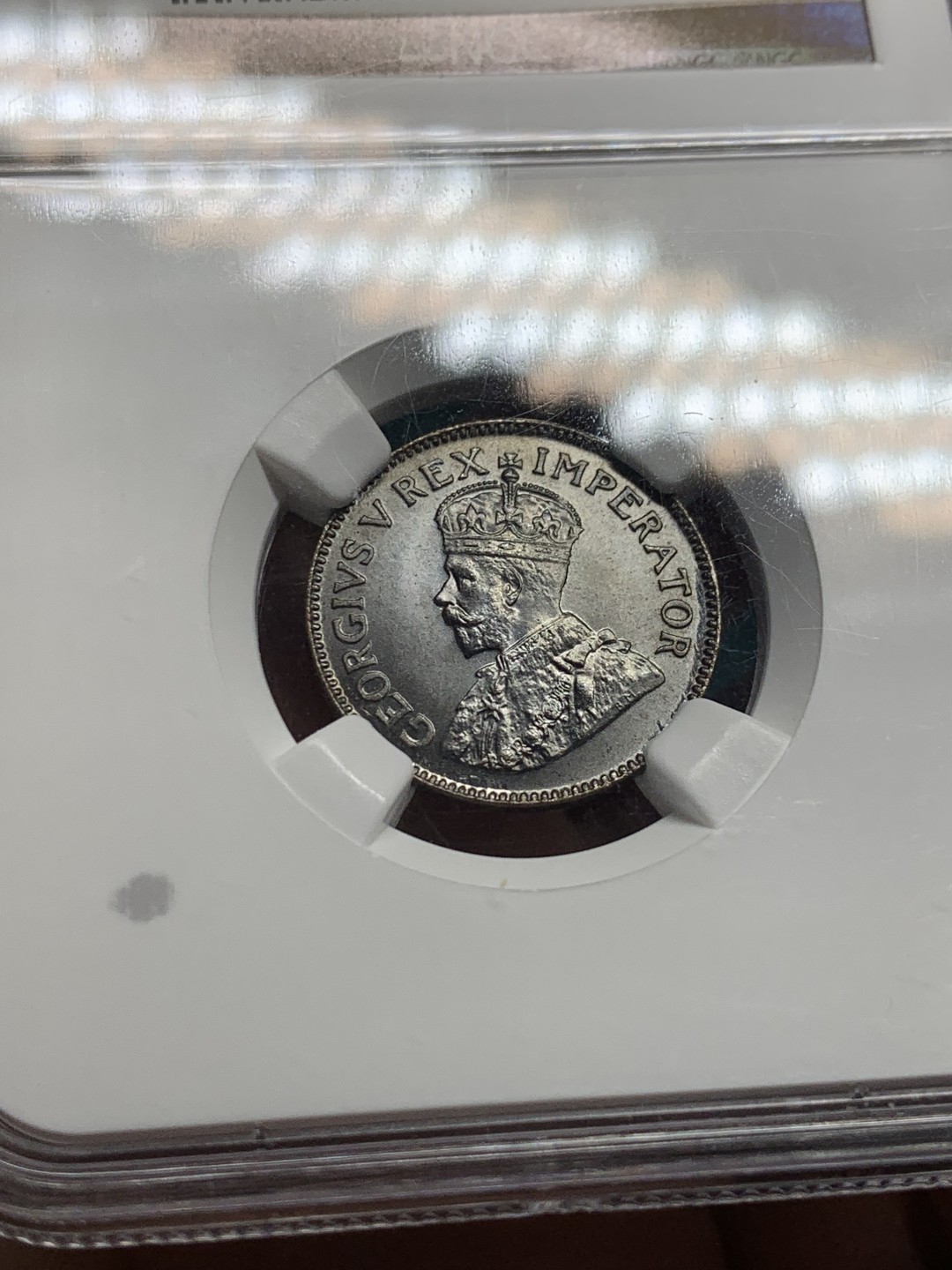 《竞宝斋》第147场-周日，周一 2场 (全场包邮) 亚军 NGC MS66BN 英属1928 南非乔五 1/4便士 顶级状态