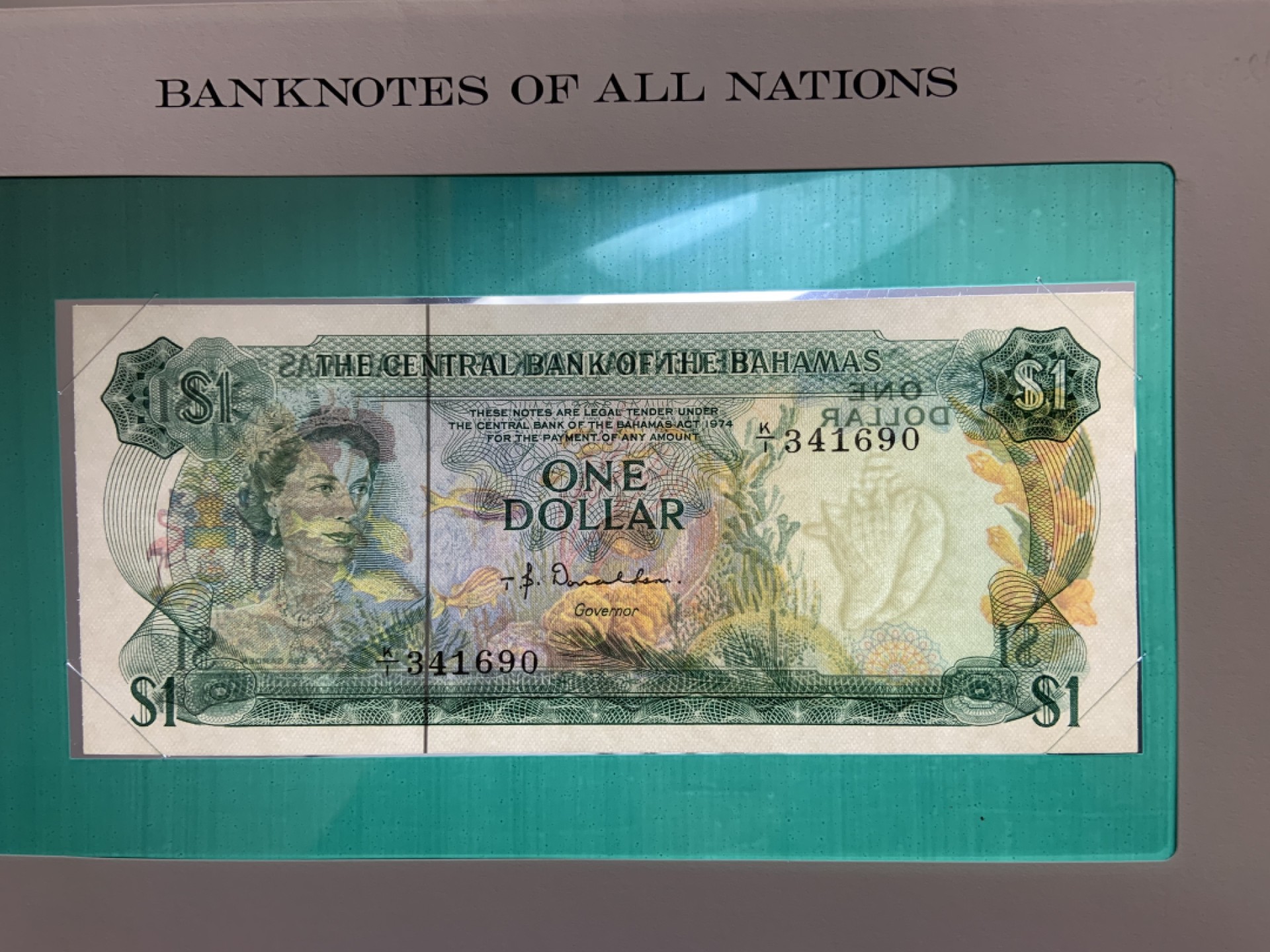 收藏联盟Quantum Auction 第244期拍卖  巴哈马1974年1元富兰克林邮币封  品相UNC b版骑冠