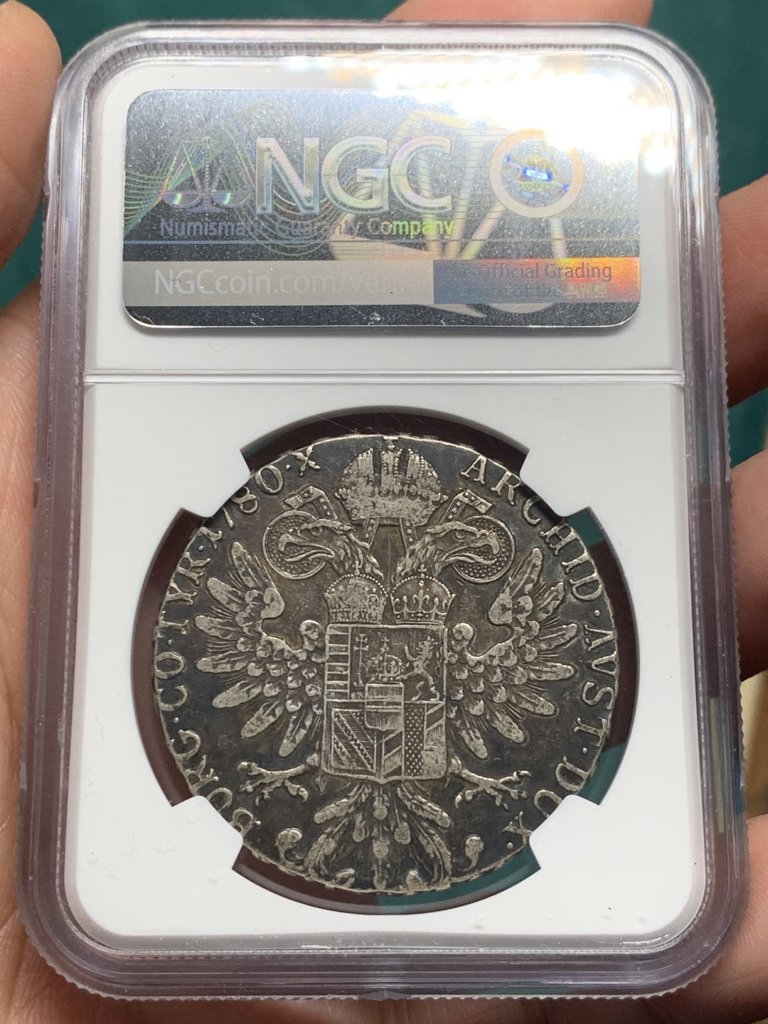 《竞宝斋》第147场-周日，周一 2场 (全场包邮) NGC-XF45 奥地利1780年 大奶妈泰勒 这枚看包浆和羽毛应该是早期的罗马版的后铸