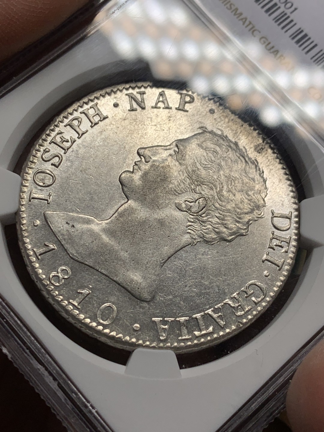 《竞宝斋》第147场-周日，周一 2场 (全场包邮) NGC AU58 1810年 法占西班牙 约瑟夫拿破仑20R银币，细节极佳 发丝清晰 光感十足 低评了