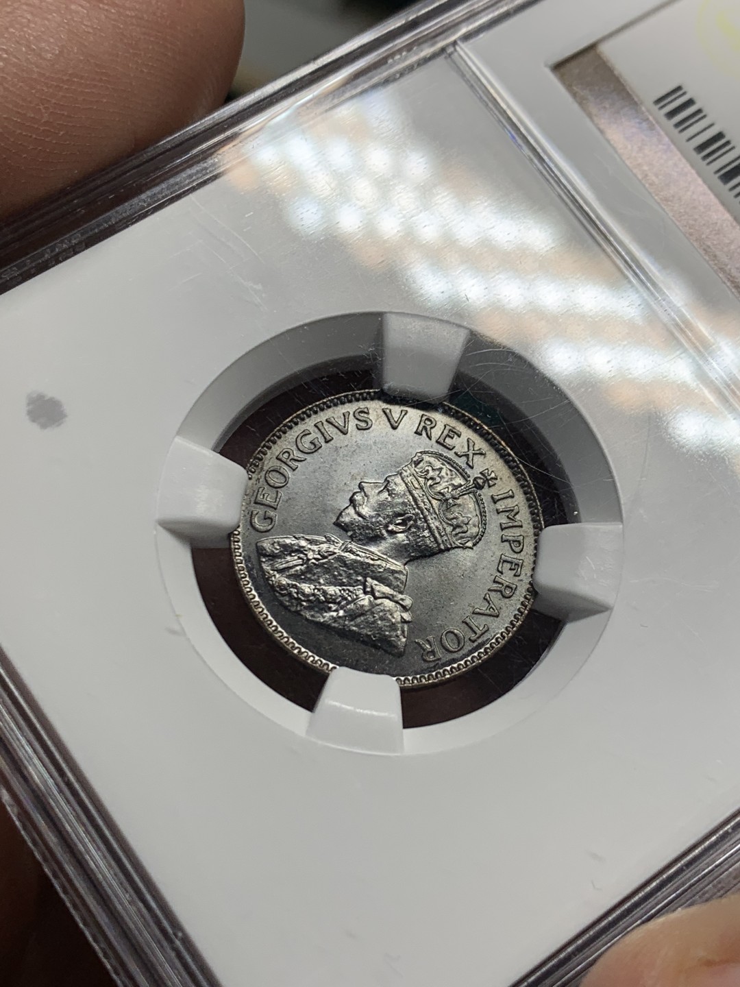 《竞宝斋》第147场-周日，周一 2场 (全场包邮) 亚军 NGC MS66BN 英属1928 南非乔五 1/4便士 顶级状态