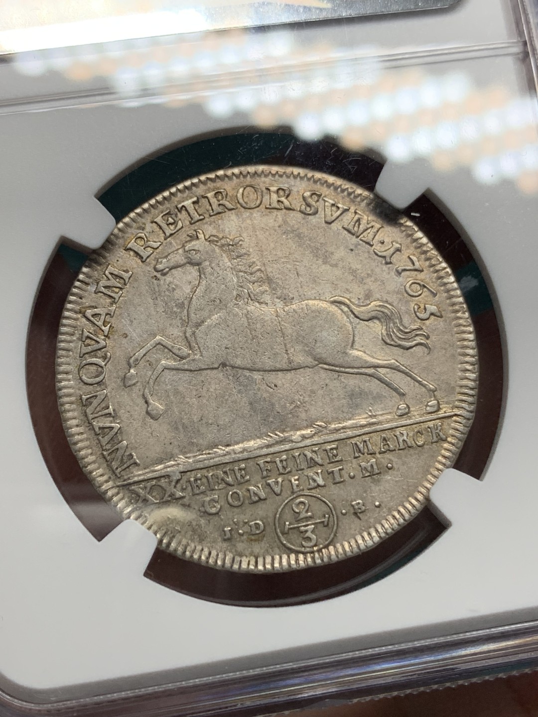 《竞宝斋》第147场-周日，周一 2场 (全场包邮) NGC-AU55第三名 德国布伦瑞克1765年奔马2/3泰勒银币