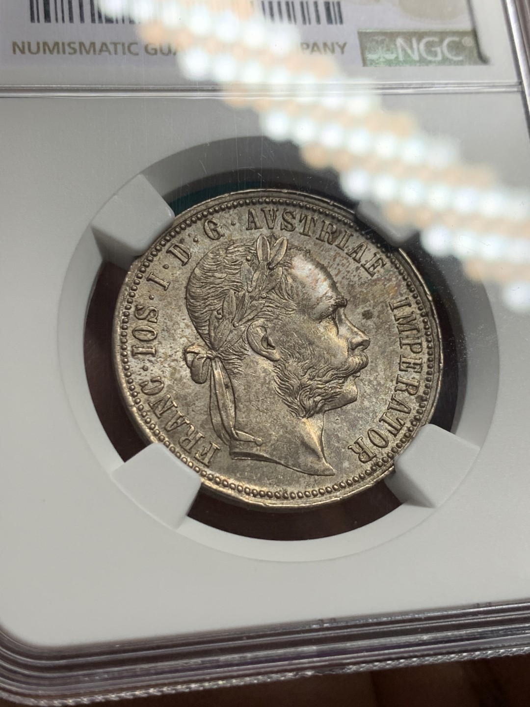 《竞宝斋》第147场-周日，周一 2场 (全场包邮) NGC-AU58 奥地利 1889年 弗朗茨1弗洛林银币 五彩好状态