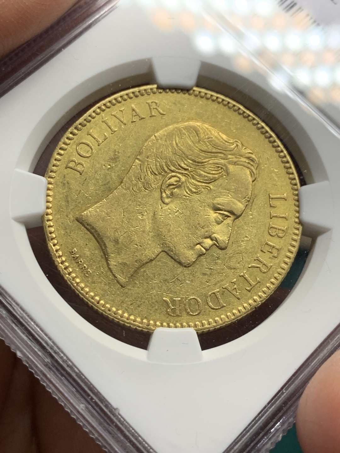 《竞宝斋》第147场-周日，周一 2场 (全场包邮) NGC-AU 委内瑞拉1887年 100玻利瓦尔大金币 南美系早期金币 大多数都已经涨上天了 只有这款算是洼地