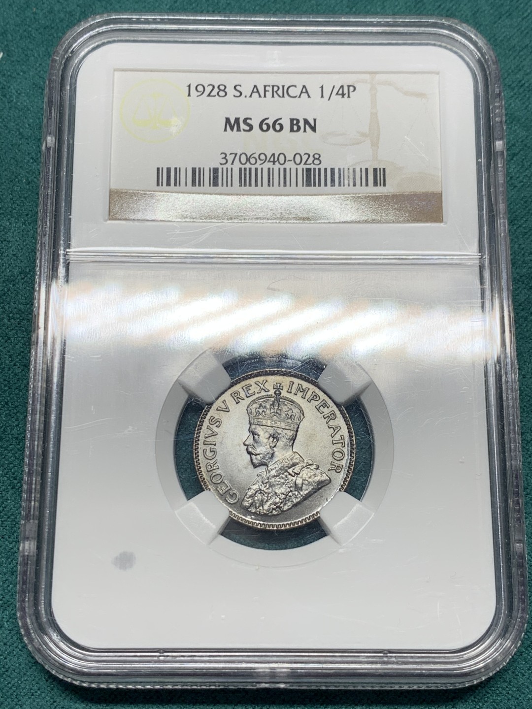 《竞宝斋》第147场-周日，周一 2场 (全场包邮) 亚军 NGC MS66BN 英属1928 南非乔五 1/4便士 顶级状态