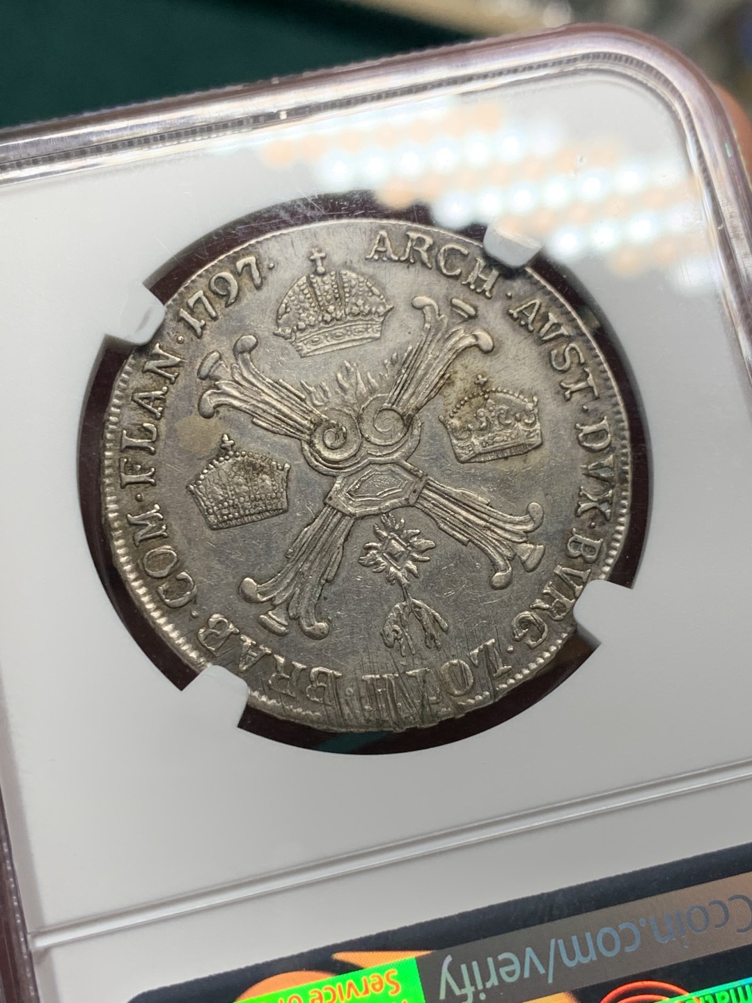 《竞宝斋》第147场-周日，周一 2场 (全场包邮) NGC-XF 1797年 奥属尼德兰 弗朗茨二世1/2泰勒  神罗末代皇帝 背面的状态非常好，皇冠十字高点俱在，细节超赞