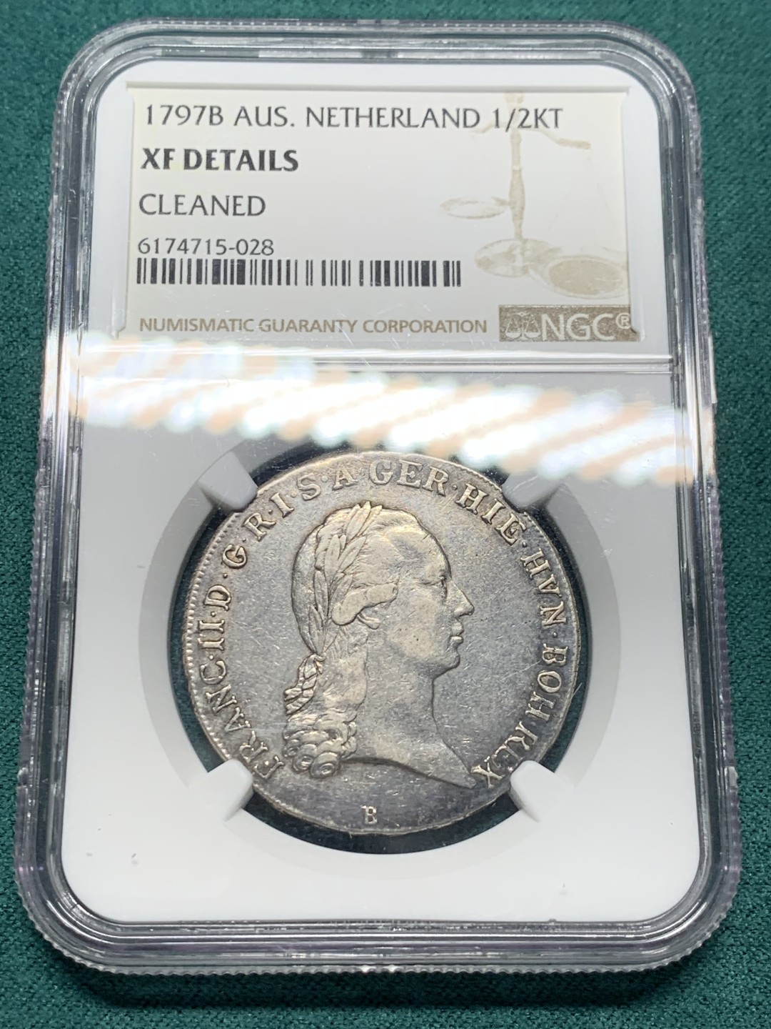 《竞宝斋》第147场-周日，周一 2场 (全场包邮) NGC-XF 1797年 奥属尼德兰 弗朗茨二世1/2泰勒  神罗末代皇帝 背面的状态非常好，皇冠十字高点俱在，细节超赞