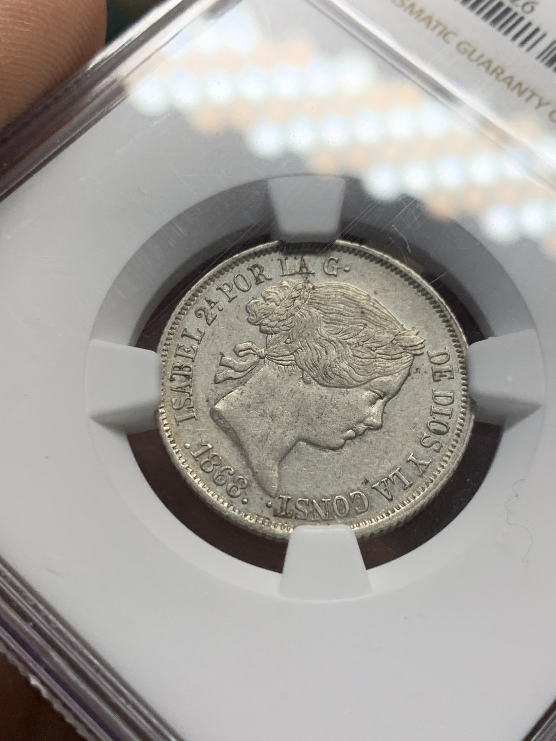 《竞宝斋》第148场-周日，周一 2场 (全场包邮) NGC-AU53 西班牙 1868 猪头妹妹 40分银币（2角型）少见品种