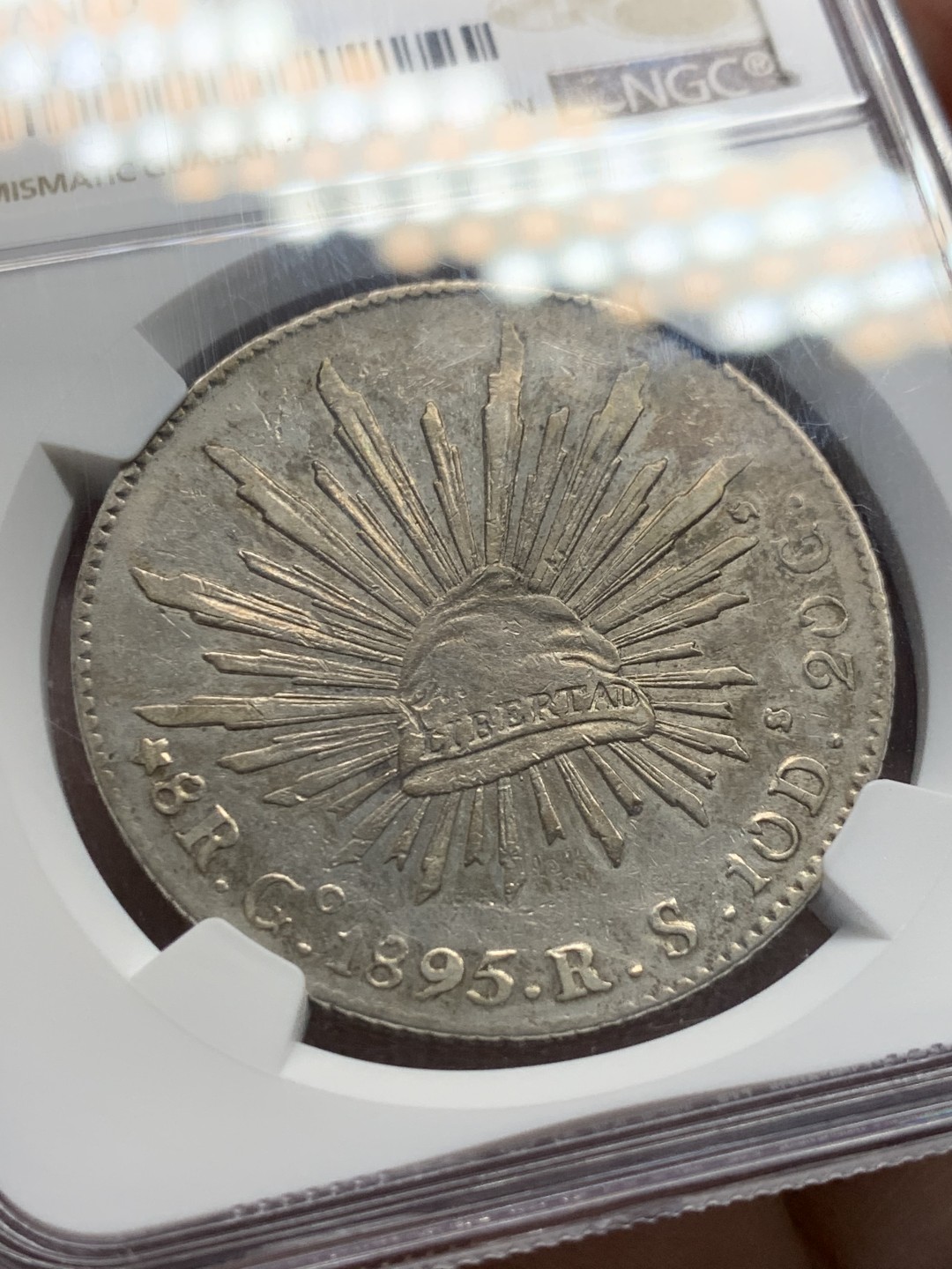 《竞宝斋》第148场-周日，周一 2场 (全场包邮) NGC AU 墨西哥 1895/1 骑字版 Go厂花边鹰洋 8R大银币