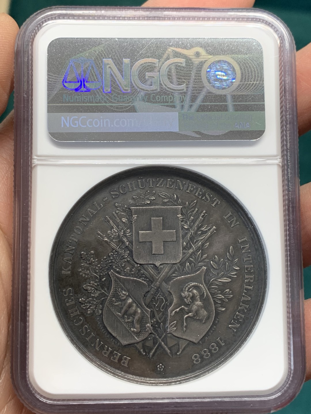 《竞宝斋》第148场-周日，周一 2场 (全场包邮) NGC-MS61 瑞士1888年 狩猎节大银章 背面三徽 系列里的难点