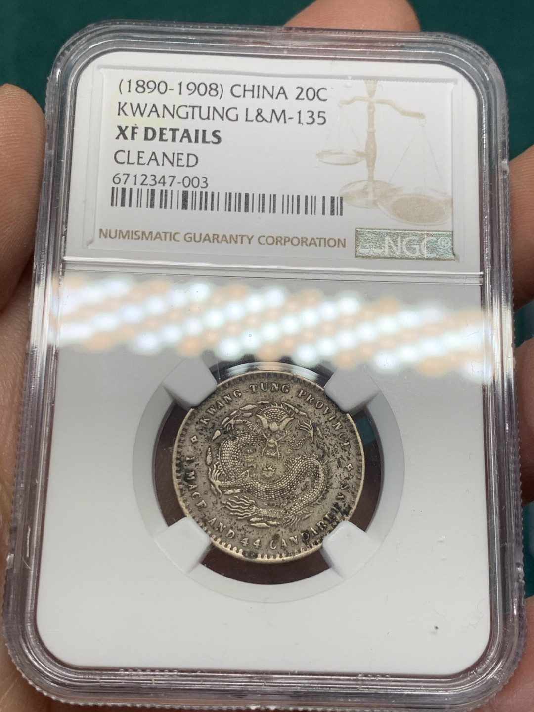 《竞宝斋》第148场-周日，周一 2场 (全场包邮) NGC-XFD 广东光绪龙毫1.44 包浆还可以的，龙鳞也清晰，不知道为啥给了个XFD