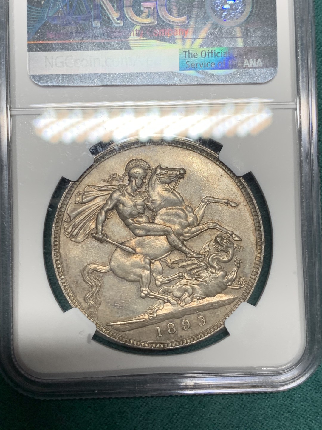 《竞宝斋》第148场-周日，周一 2场 (全场包邮) NGC-MS63 英国 1893年维多利亚 披纱 马剑银币 五彩转光 镜面底板