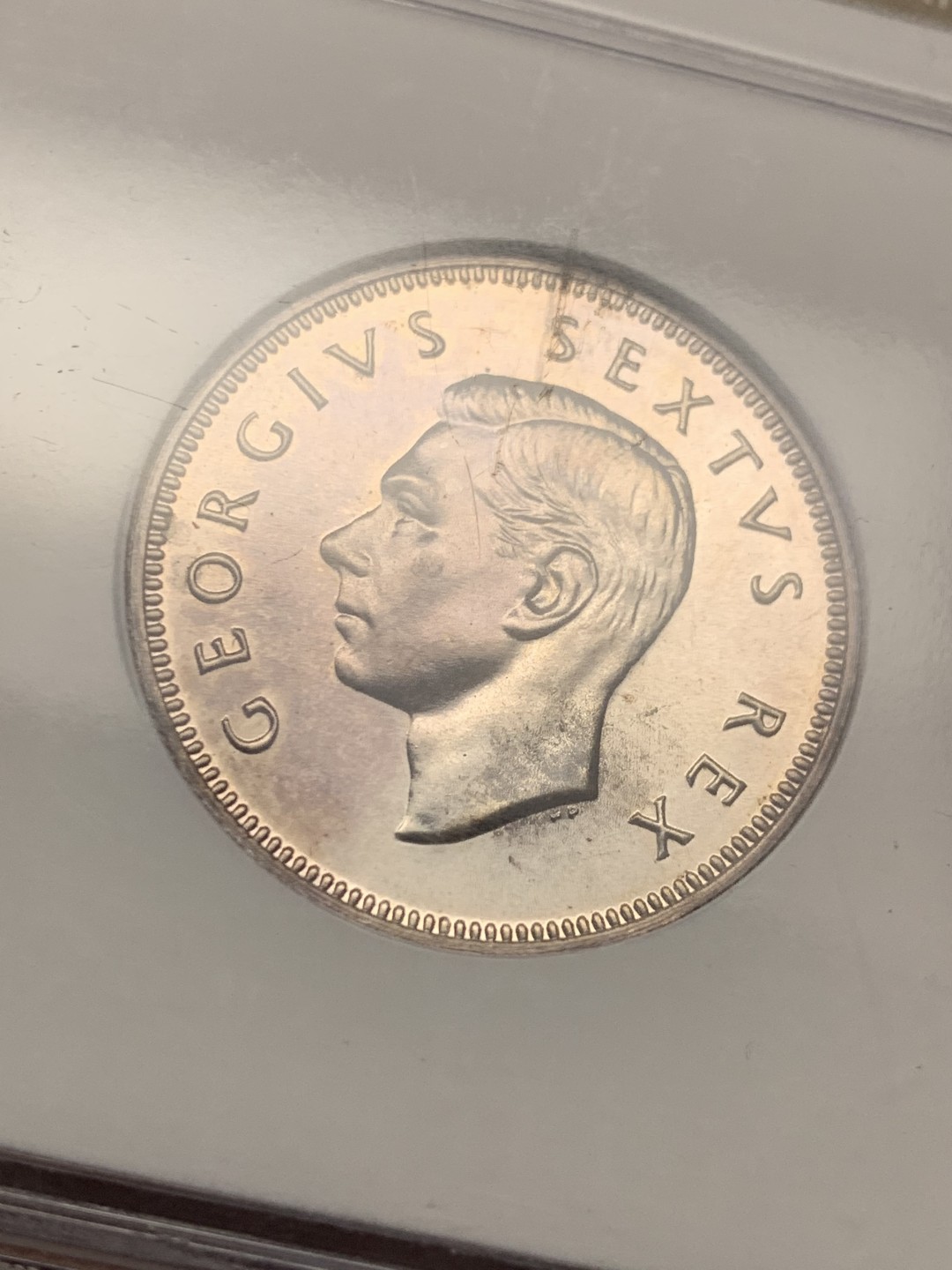 《竞宝斋》第148场-周日，周一 2场 (全场包邮) 亚军 NGC PF66 英属南非 1949乔六精制弗洛林银币 精制难得状态