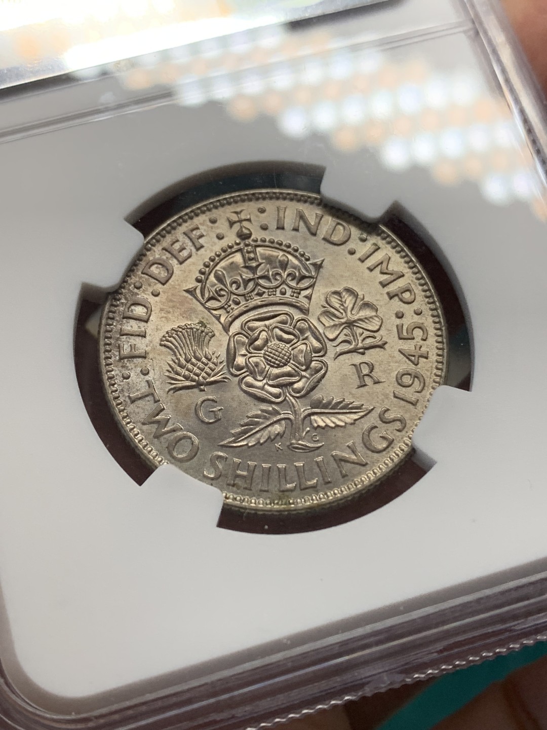 《竞宝斋》第148场-周日，周一 2场 (全场包邮) NGC-MS62 英国 1945年 乔治六世1弗洛林银币 原光淡彩 光度非常好 背面状态不输64