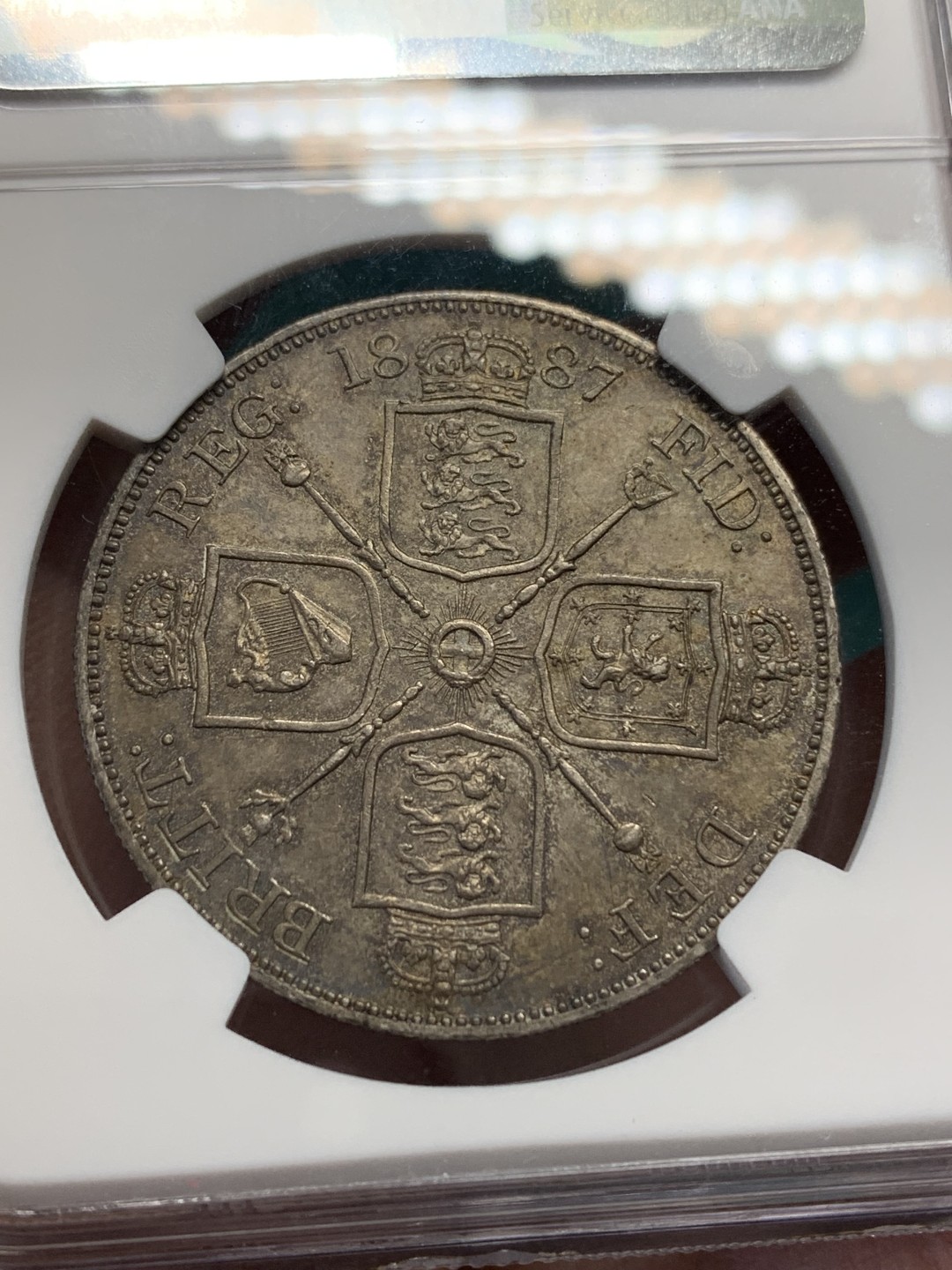 《竞宝斋》第148场-周日，周一 2场 (全场包邮) NGC MS63 英国 1887年 维多利亚 双弗洛林银币 酱彩包浆