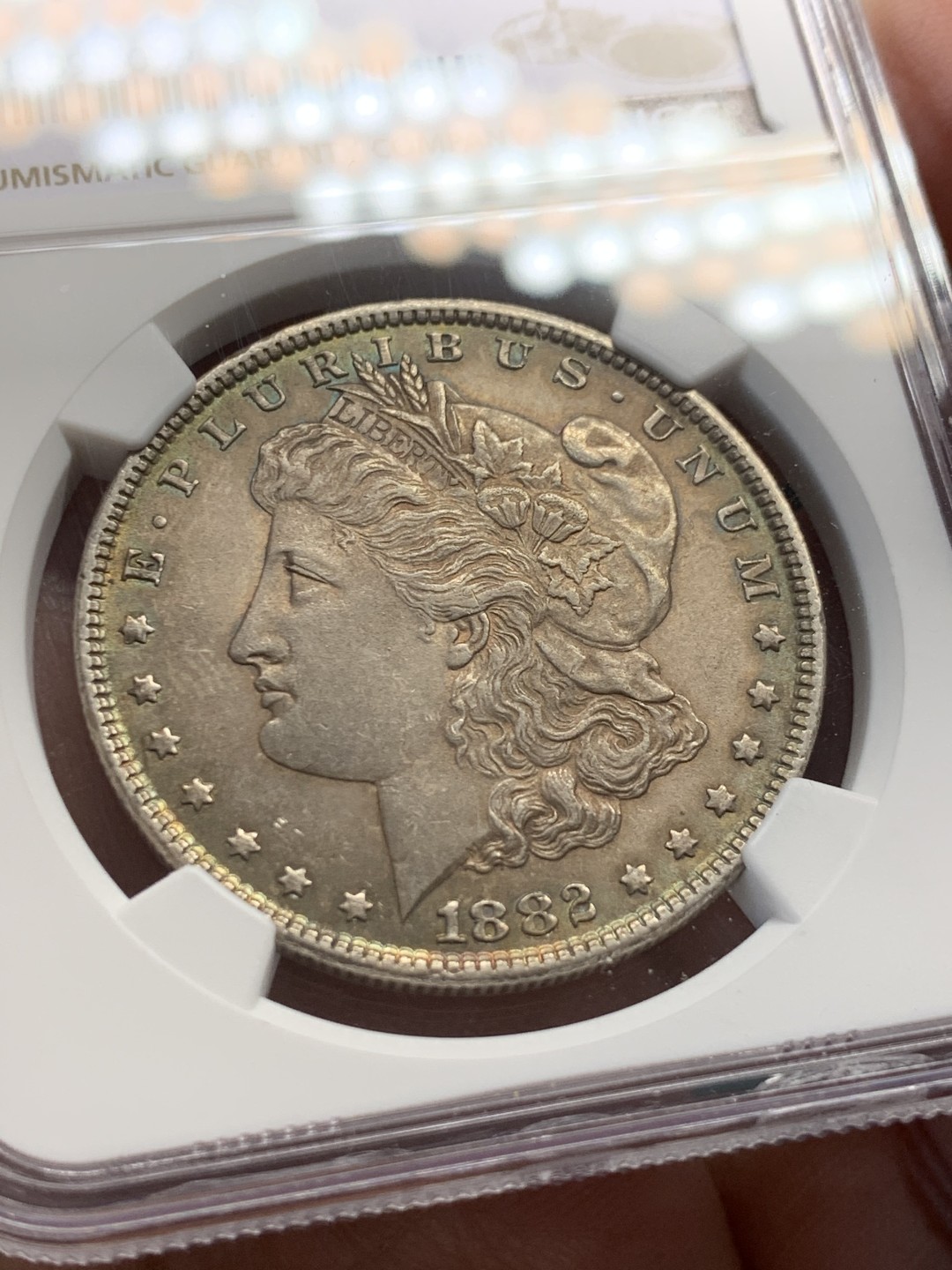 《竞宝斋》第148场-周日，周一 2场 (全场包邮) NGC-MS61 美国1882年 摩根一元大银币 五彩包浆