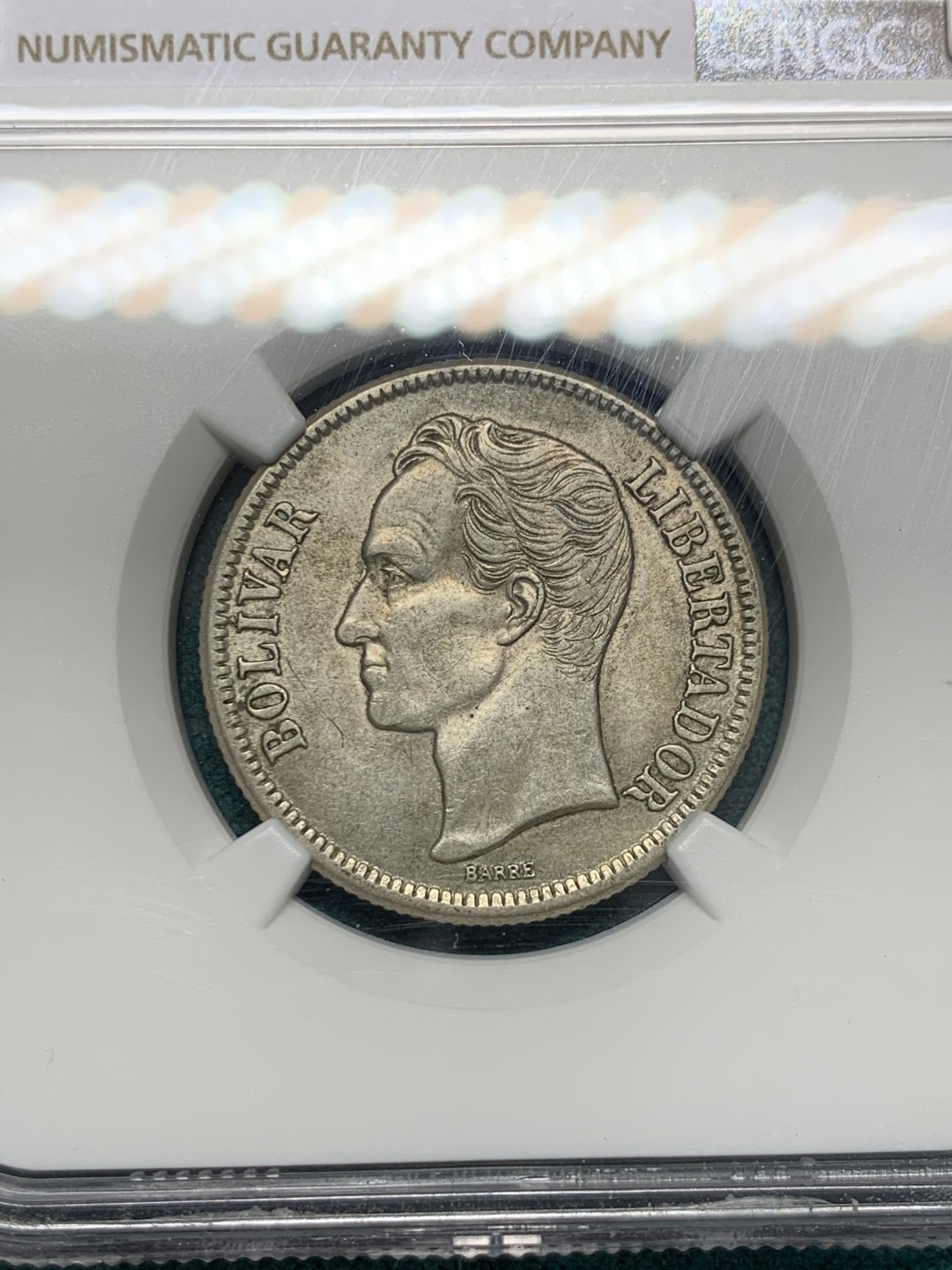 《竞宝斋》第148场-周日，周一 2场 (全场包邮) NGC-AU58 委内瑞拉1945年 2玻利瓦尔银币 这个面值好品更加少见