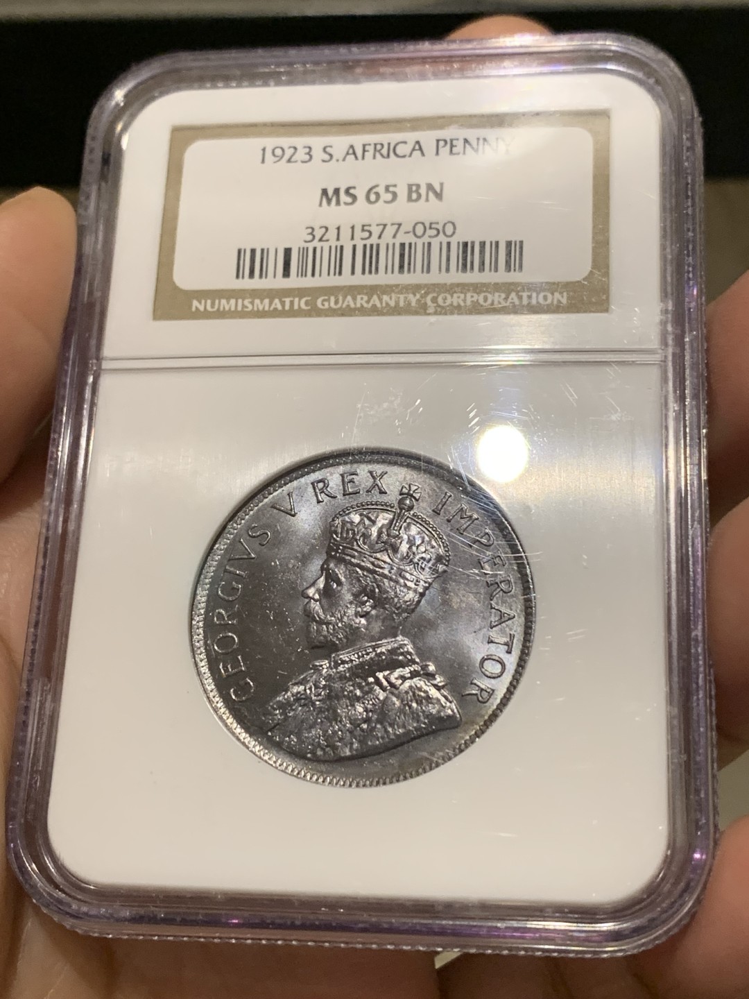 《竞宝斋》第148场-周日，周一 2场 (全场包邮) 季军 NGC MS65BN 英属南非 1923 乔五1便士铜币 恰好百年 保存难得