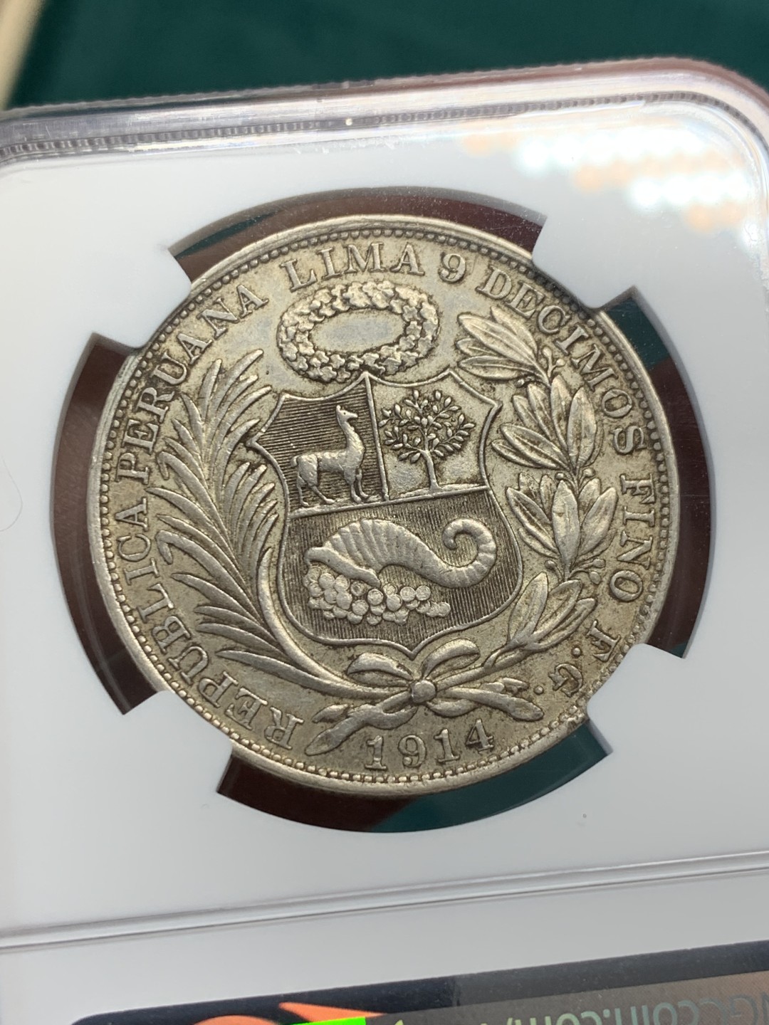 《竞宝斋》第148场-周日，周一 2场 (全场包邮) NGC AU55 秘鲁 1914年 1索尔银币 坐女神前期高银版