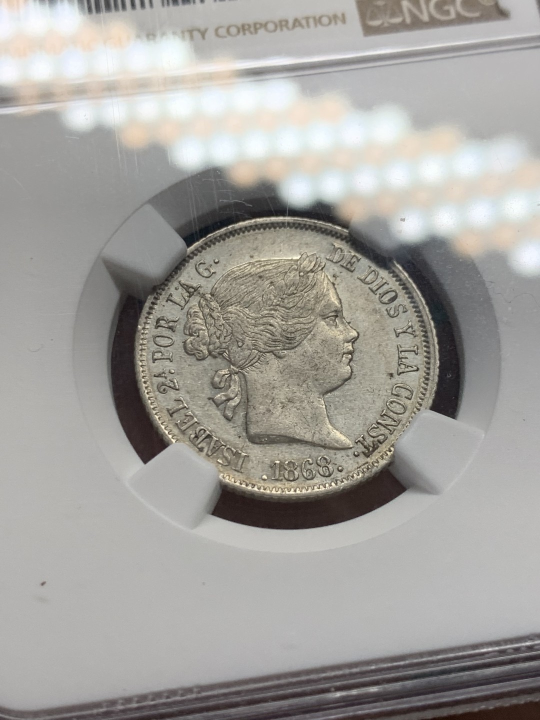 《竞宝斋》第148场-周日，周一 2场 (全场包邮) NGC-AU53 西班牙 1868 猪头妹妹 40分银币（2角型）少见品种