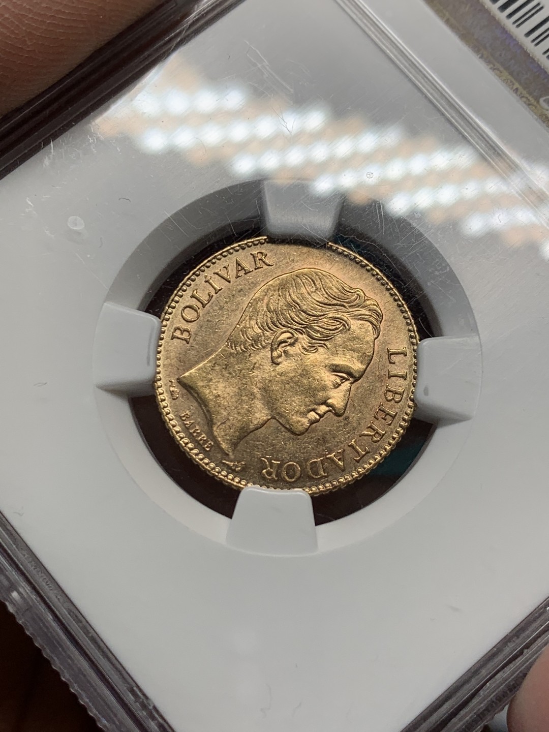 《竞宝斋》第148场-周日，周一 2场 (全场包邮) NGC-MS61 1904 委内瑞拉 20玻利瓦尔金币 6.45克 低评了