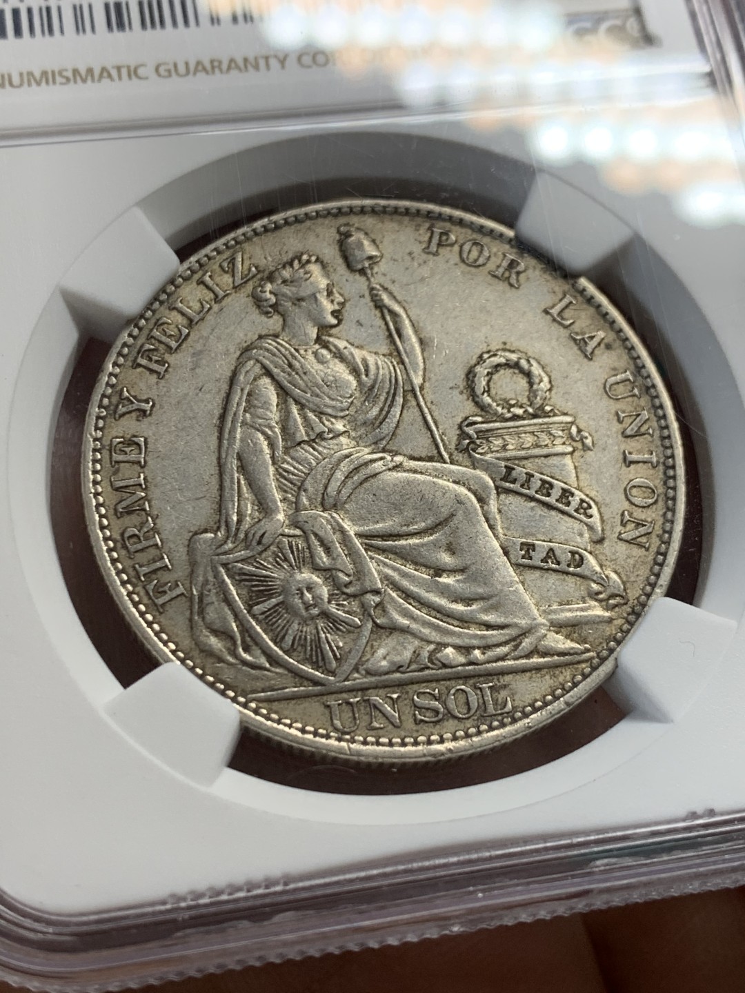 《竞宝斋》第148场-周日，周一 2场 (全场包邮) NGC AU55 秘鲁 1914年 1索尔银币 坐女神前期高银版