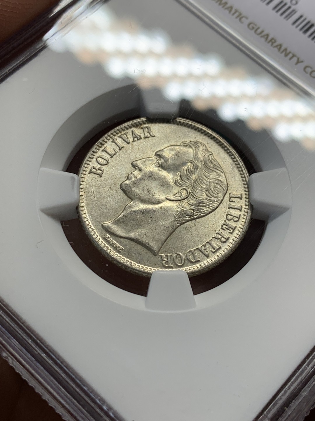 《竞宝斋》第148场-周日，周一 2场 (全场包邮) NGC-MS63 委内瑞拉1954年 1玻利瓦尔银币 原光好品