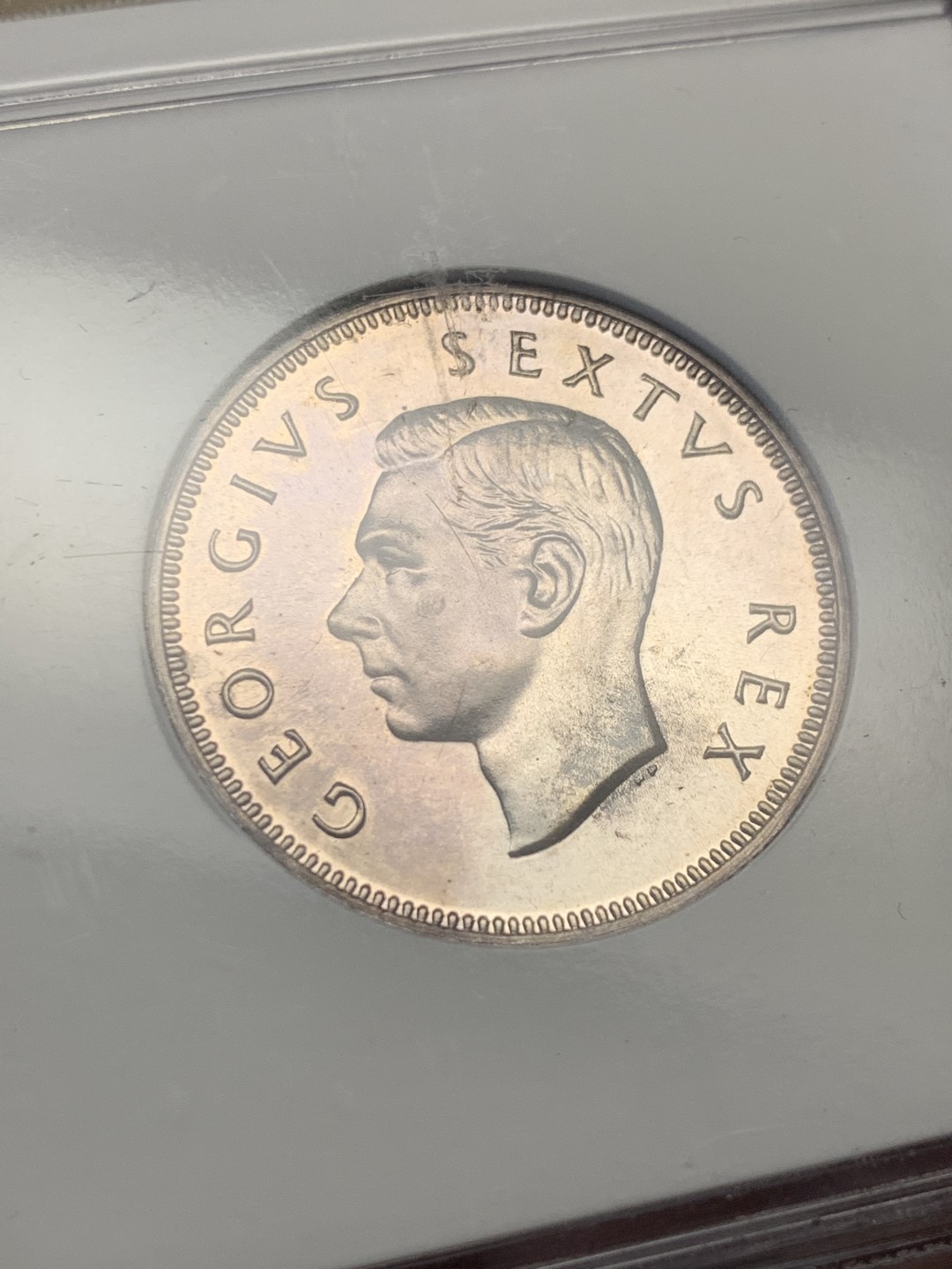 《竞宝斋》第148场-周日，周一 2场 (全场包邮) 亚军 NGC PF66 英属南非 1949乔六精制弗洛林银币 精制难得状态