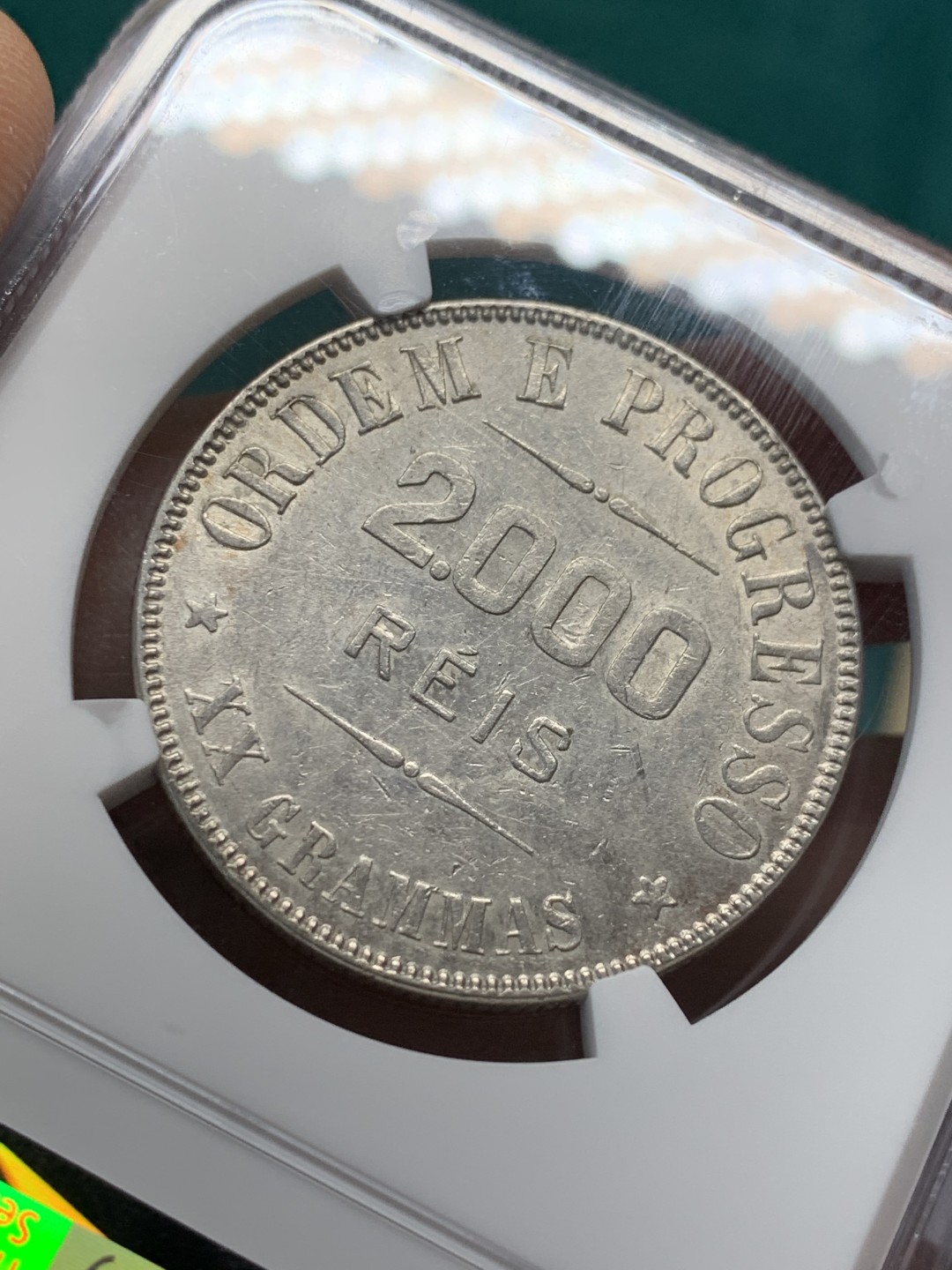 《竞宝斋》第148场-周日，周一 2场 (全场包邮) NGC AU55 巴西1908年女神2000瑞斯银币 不多的品种