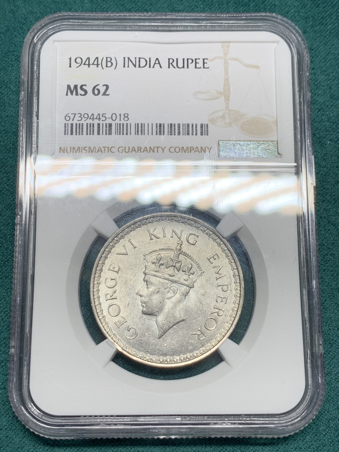 《竞宝斋》第148场-周日，周一 2场 (全场包邮) NGC MS62 英属印度 1944年B版 乔治六世1卢比银币 reverseB版 背面精雕花纹 细节很清晰 少见版本 原光好品
