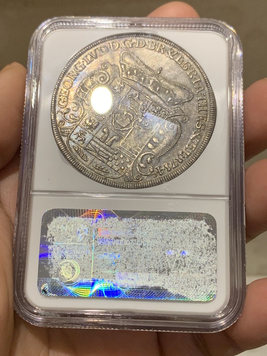 《竞宝斋》第148场-周日，周一 2场 (全场包邮) 唯一冠军分 NGC MS62 德国 布伦瑞克1714年 野人 泰勒大银币 脸部清晰 草裙飞扬 深彩包浆 一枚便是全部