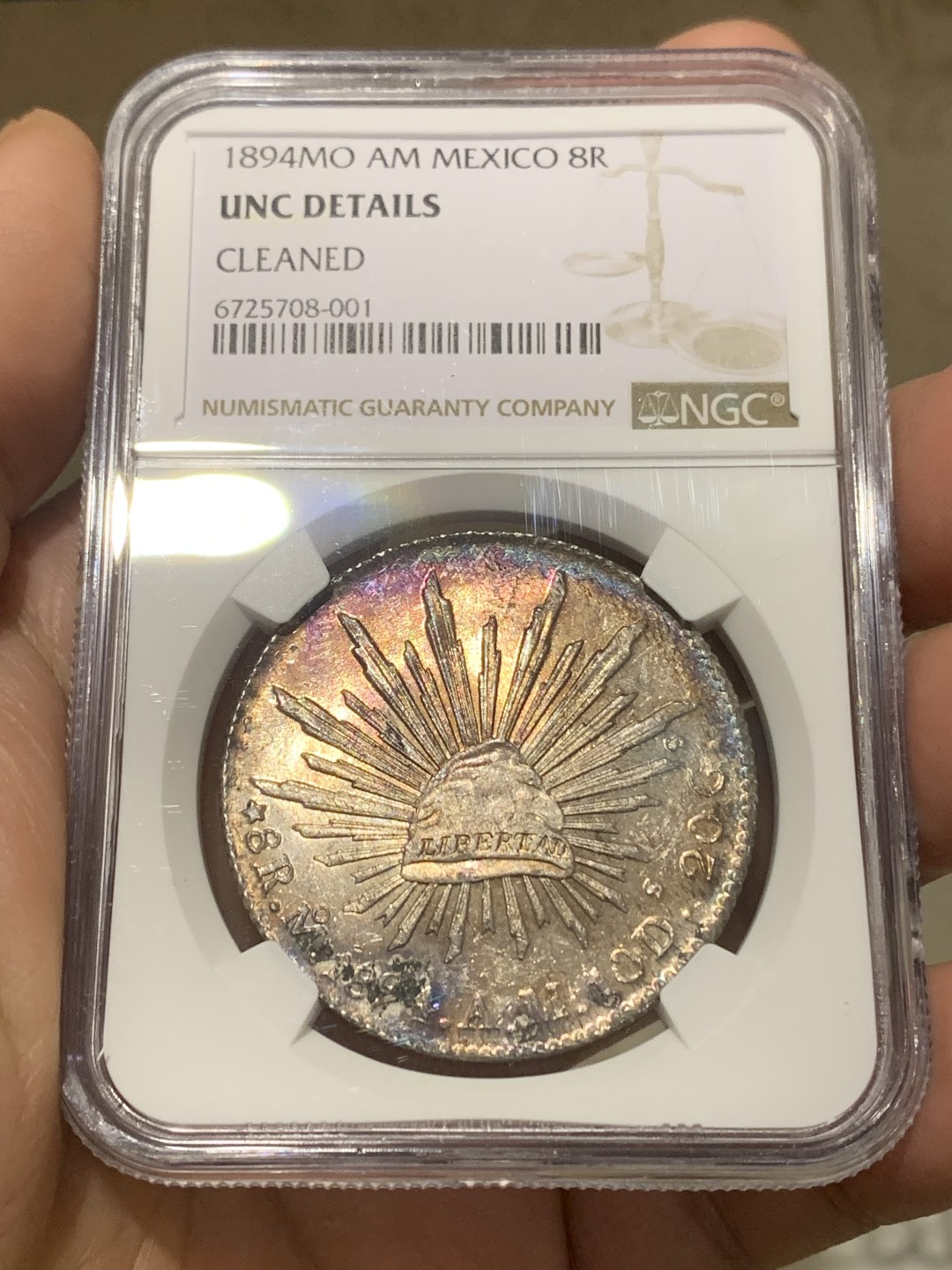 《竞宝斋》第148场-周日，周一 2场 (全场包邮) NGC UNC 1894年 墨西哥 鹰洋 镜面底板，正面彩虹包浆 背面极好