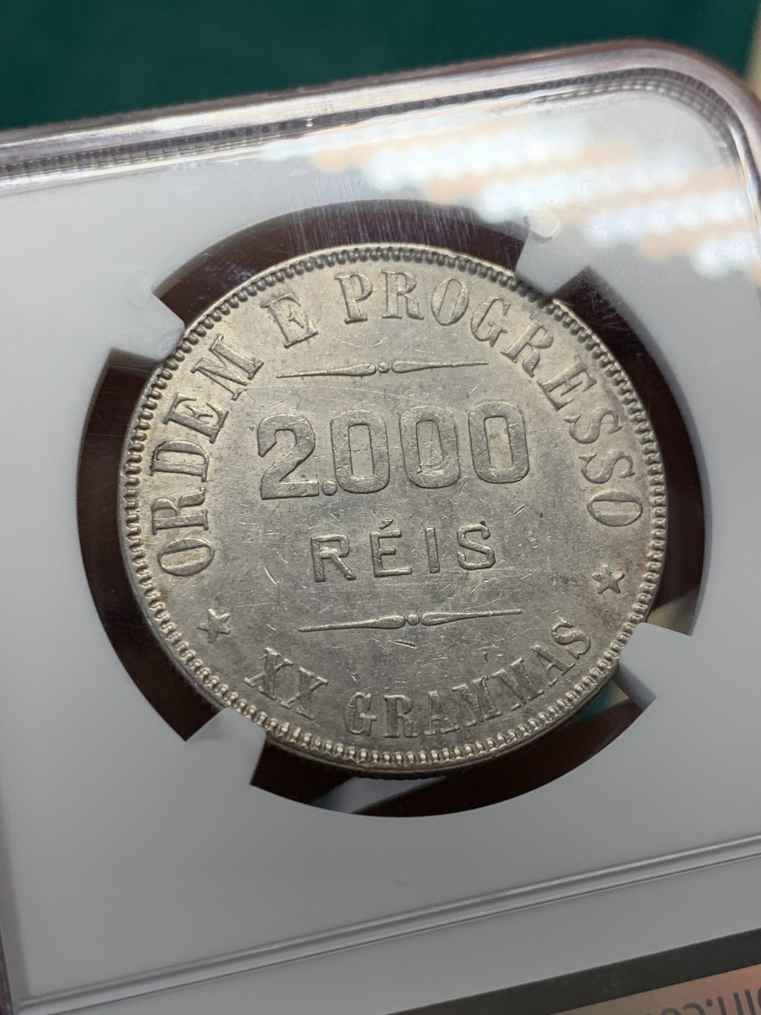 《竞宝斋》第148场-周日，周一 2场 (全场包邮) NGC AU55 巴西1908年女神2000瑞斯银币 不多的品种