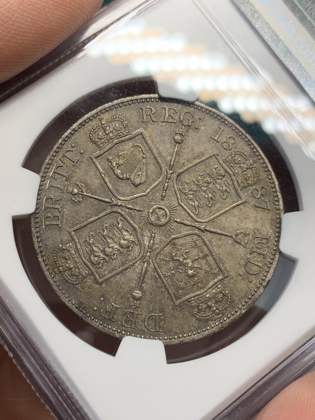 《竞宝斋》第148场-周日，周一 2场 (全场包邮) NGC MS63 英国 1887年 维多利亚 双弗洛林银币 酱彩包浆