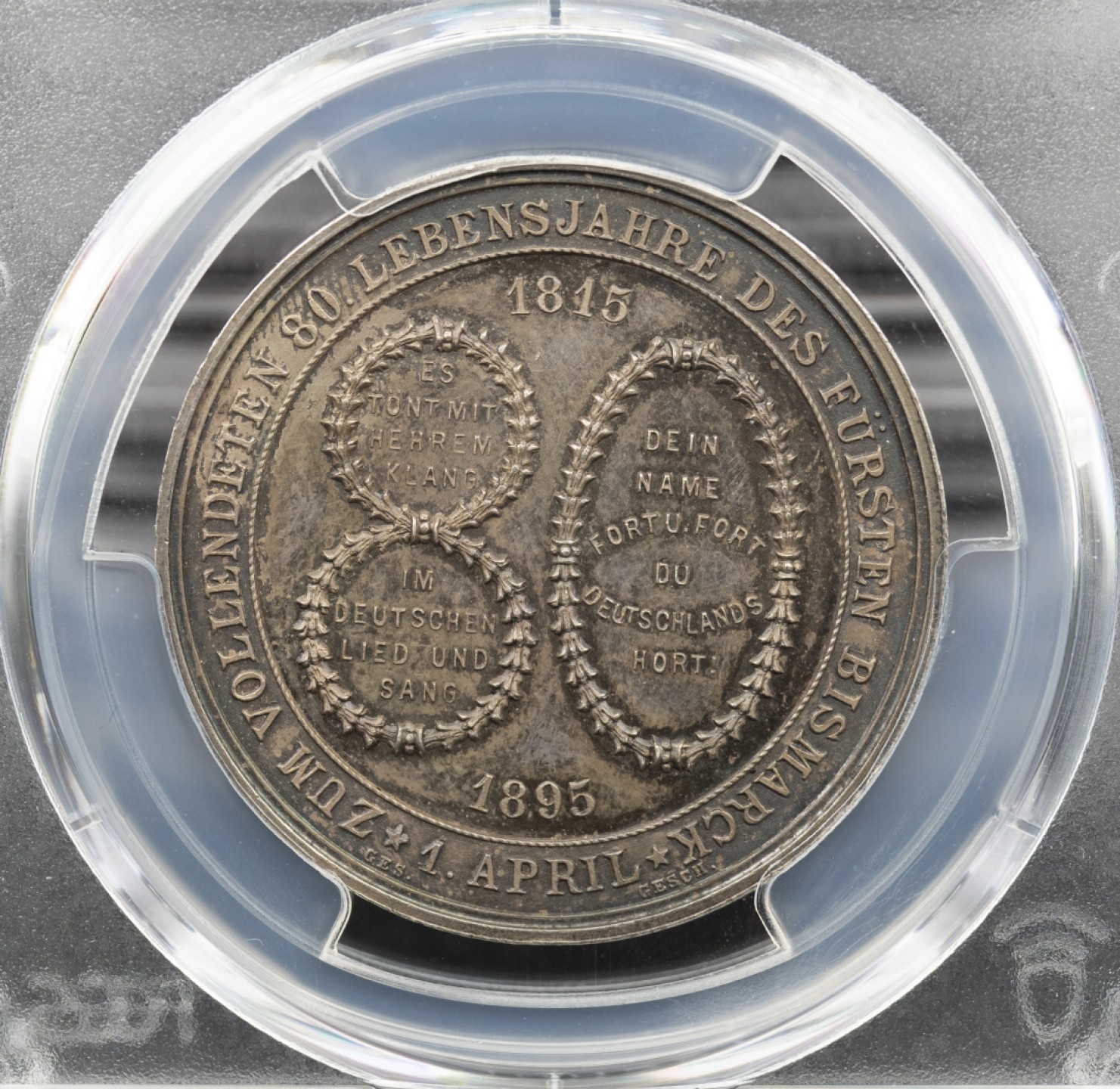 万国钱币拍卖第005期 1895年德国俾斯麦80大寿纪念银章，通体五彩，最为经典的一款设计