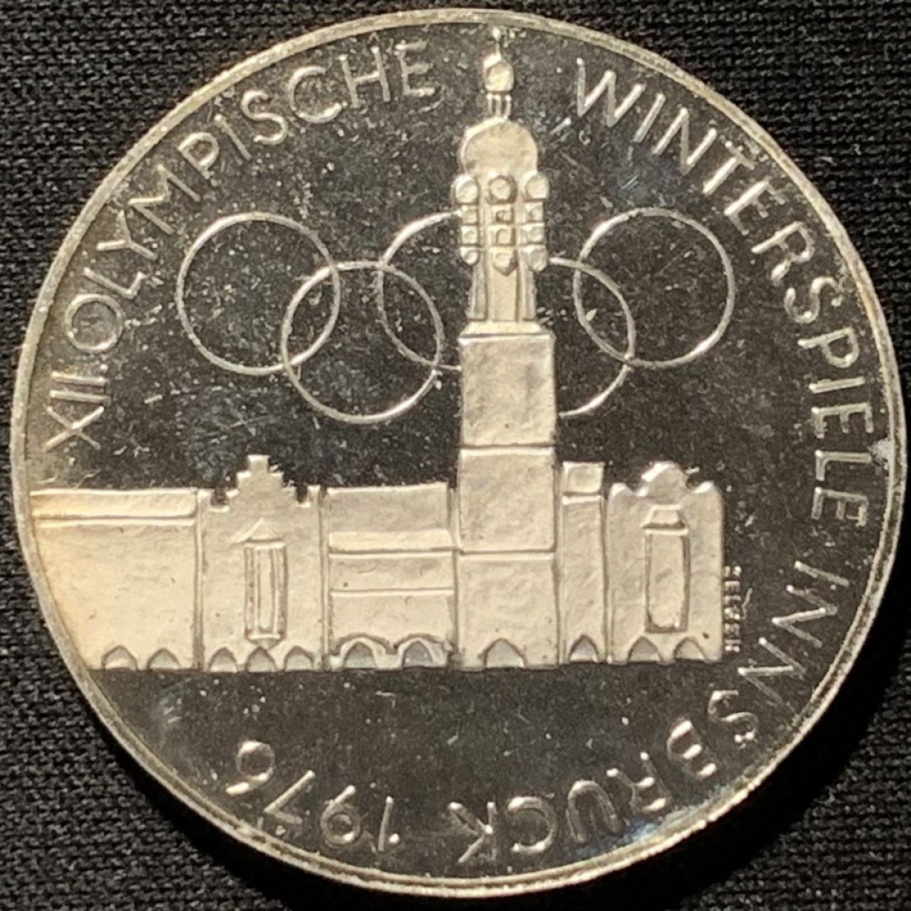 紫瑗钱币——第262期拍卖 奥地利 1976年 因斯布鲁克冬奥运 主会场 100先令 24克 0.64银 精制
