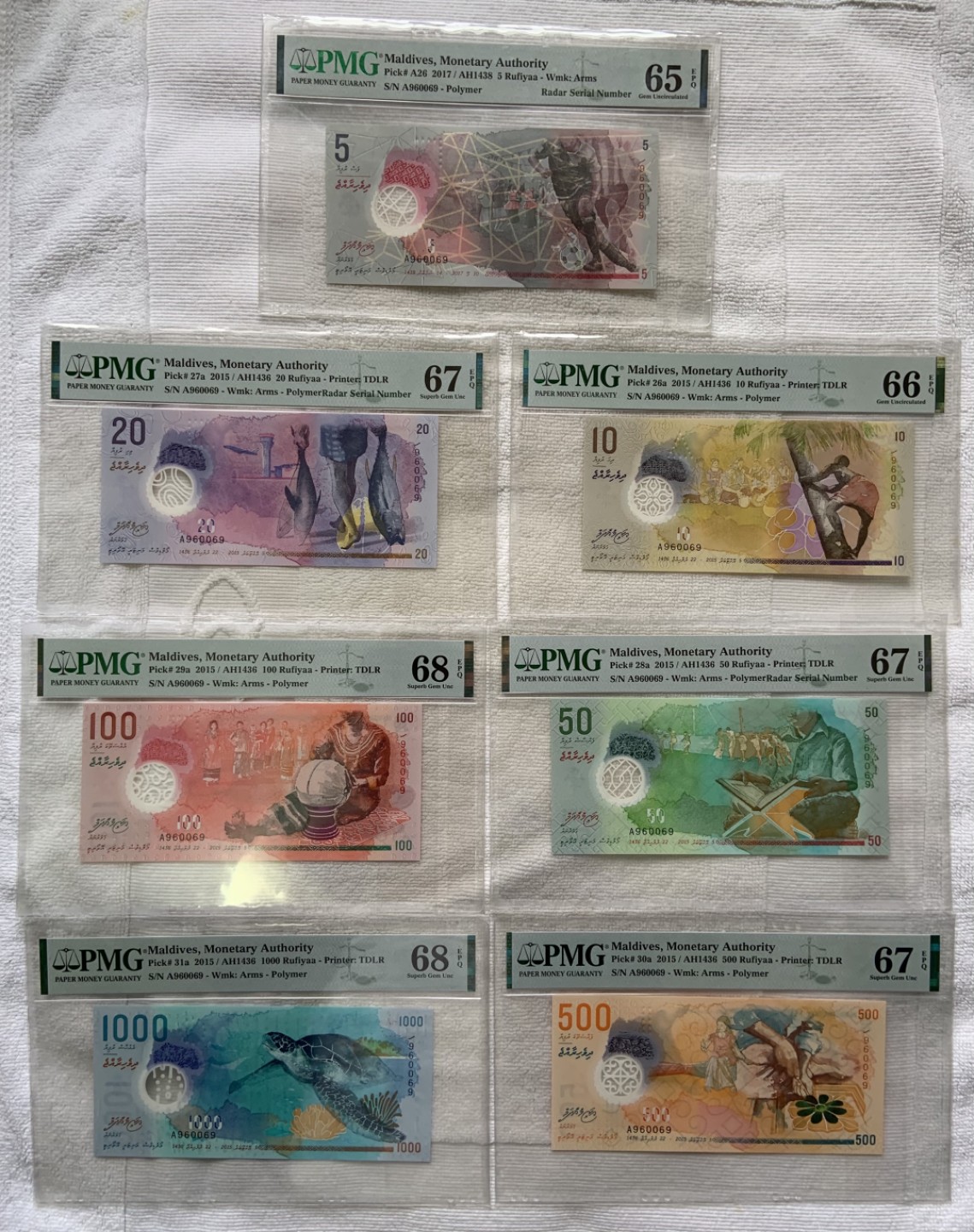 收藏联盟Quantum Auction 第246期拍卖 马尔代夫2015年5-1000拉菲亚一套 PMG65-67  首发冠 全同号 雷达号 倒置号 (四号合一 四喜临门)