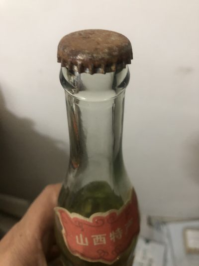 缤纷诚信拍633期 酒满花好，53度红高粱老酒一瓶，年代久远，外观如图。