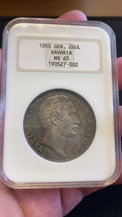 万国钱币拍卖第005期 1855德国巴伐利亚圣母抱婴2盾银币，为了纪念位于慕尼黑的圣母抱婴柱修复完成而发行，真正的原味五彩，所见最美一枚，外拍热门品种，63分ha成交价930美金。