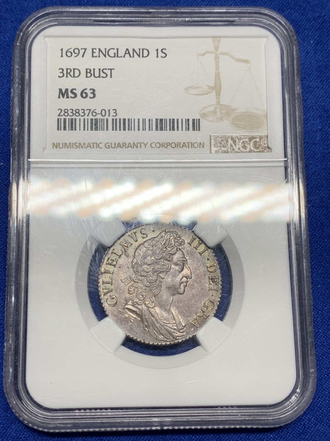 《竞宝斋》第149场-周日，周一，周四 3场 (全场包邮) NGC-MS63 1697年英国威廉三世1先令银币 深打无减重，紫灰色包浆，远超分数的状态