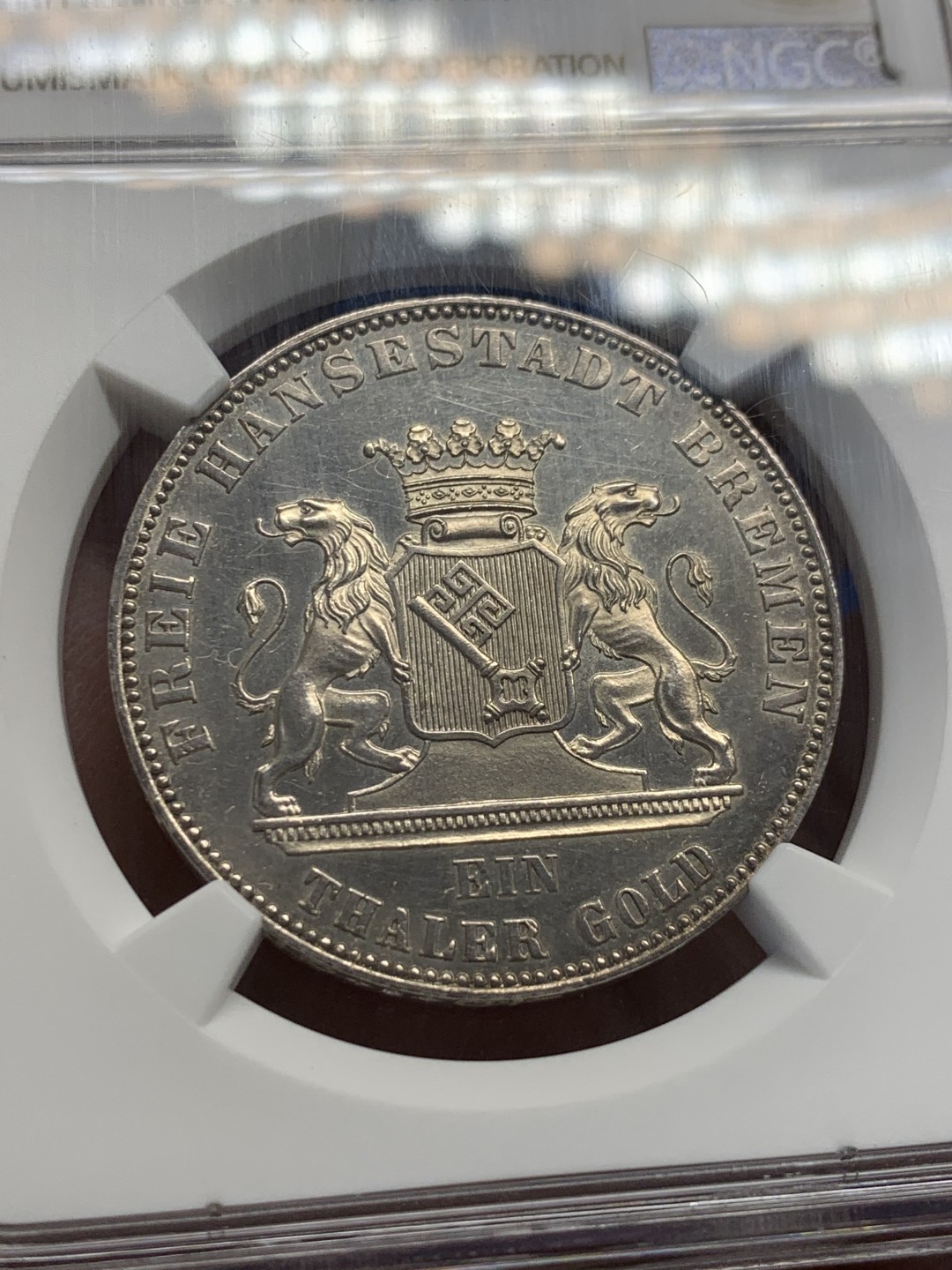 《竞宝斋》第149场-周日，周一，周四 3场 (全场包邮) NGC UNC 德国1863年不莱梅1泰勒银币德意志解放50周年纪念 该邦同时期泰勒中最少的一版，铸造量2w枚