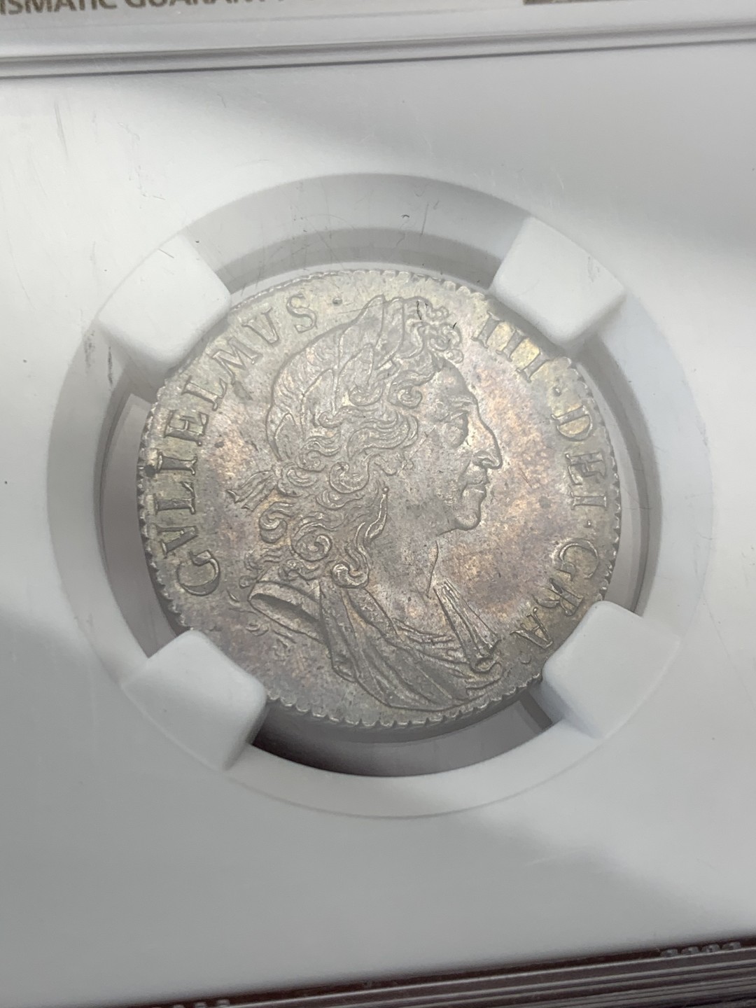 《竞宝斋》第149场-周日，周一，周四 3场 (全场包邮) NGC-MS63 1697年英国威廉三世1先令银币 深打无减重，紫灰色包浆，远超分数的状态