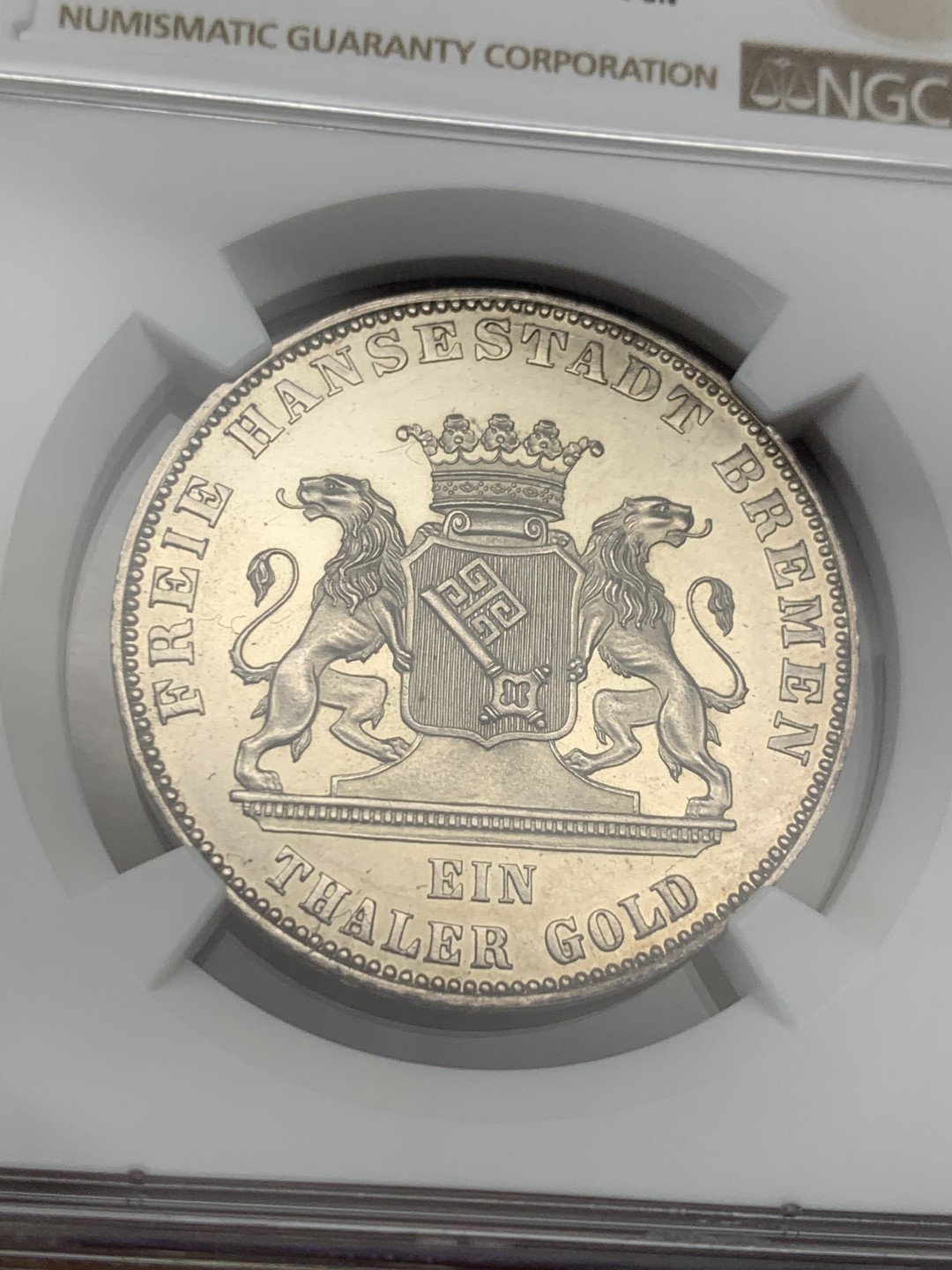 《竞宝斋》第149场-周日，周一，周四 3场 (全场包邮) NGC UNC 德国1863年不莱梅1泰勒银币德意志解放50周年纪念 该邦同时期泰勒中最少的一版，铸造量2w枚