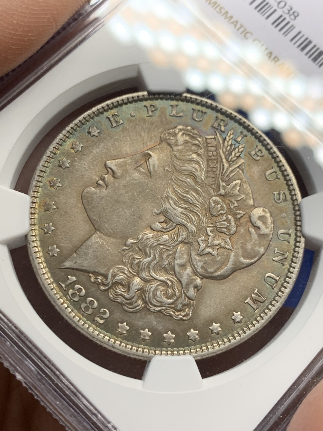 《竞宝斋》第149场-周日，周一，周四 3场 (全场包邮) NGC-MS63 美国1882年 摩根一元 五彩包浆