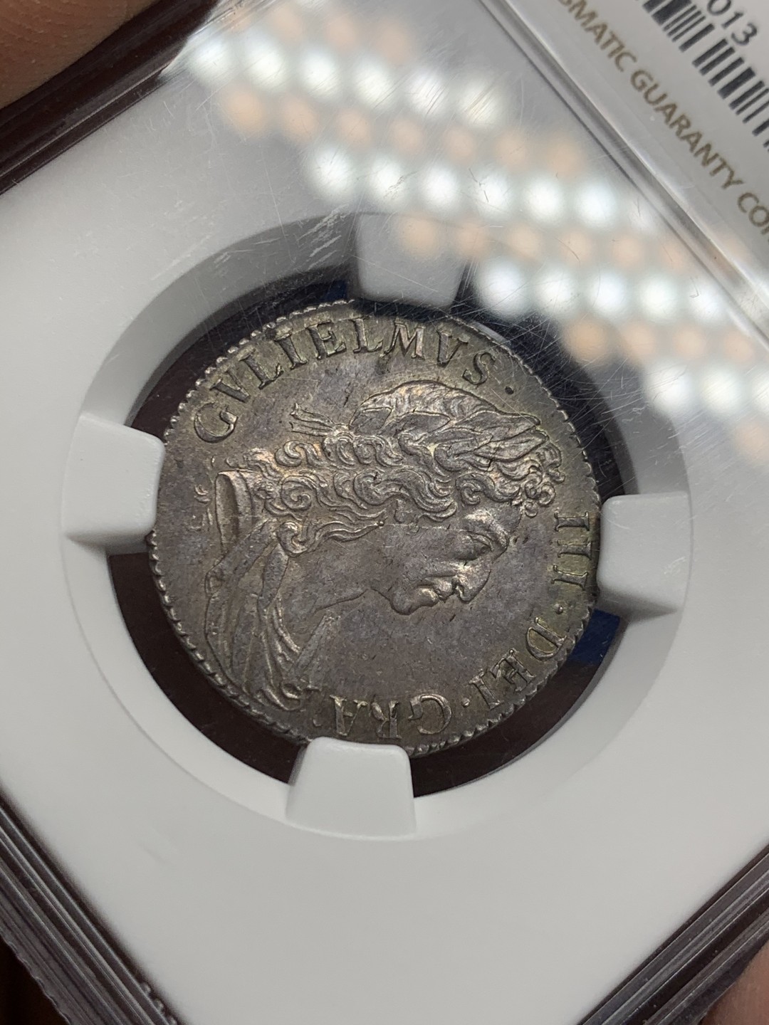 《竞宝斋》第149场-周日，周一，周四 3场 (全场包邮) NGC-MS63 1697年英国威廉三世1先令银币 深打无减重，紫灰色包浆，远超分数的状态